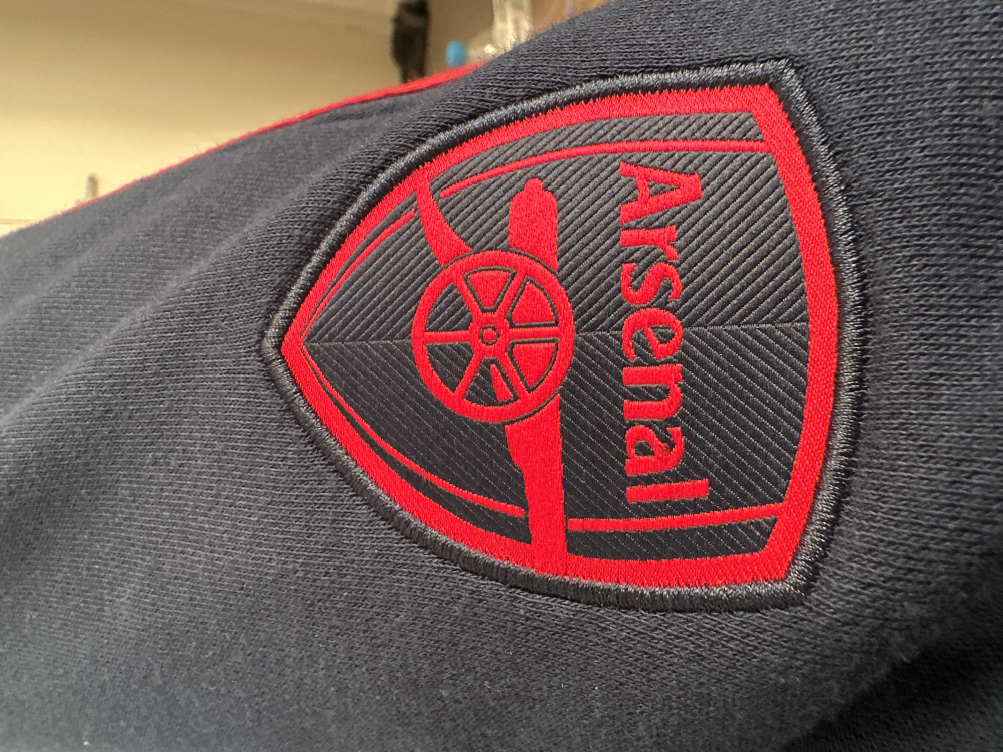 Arsenal crest and costumed woman observed in Shotton