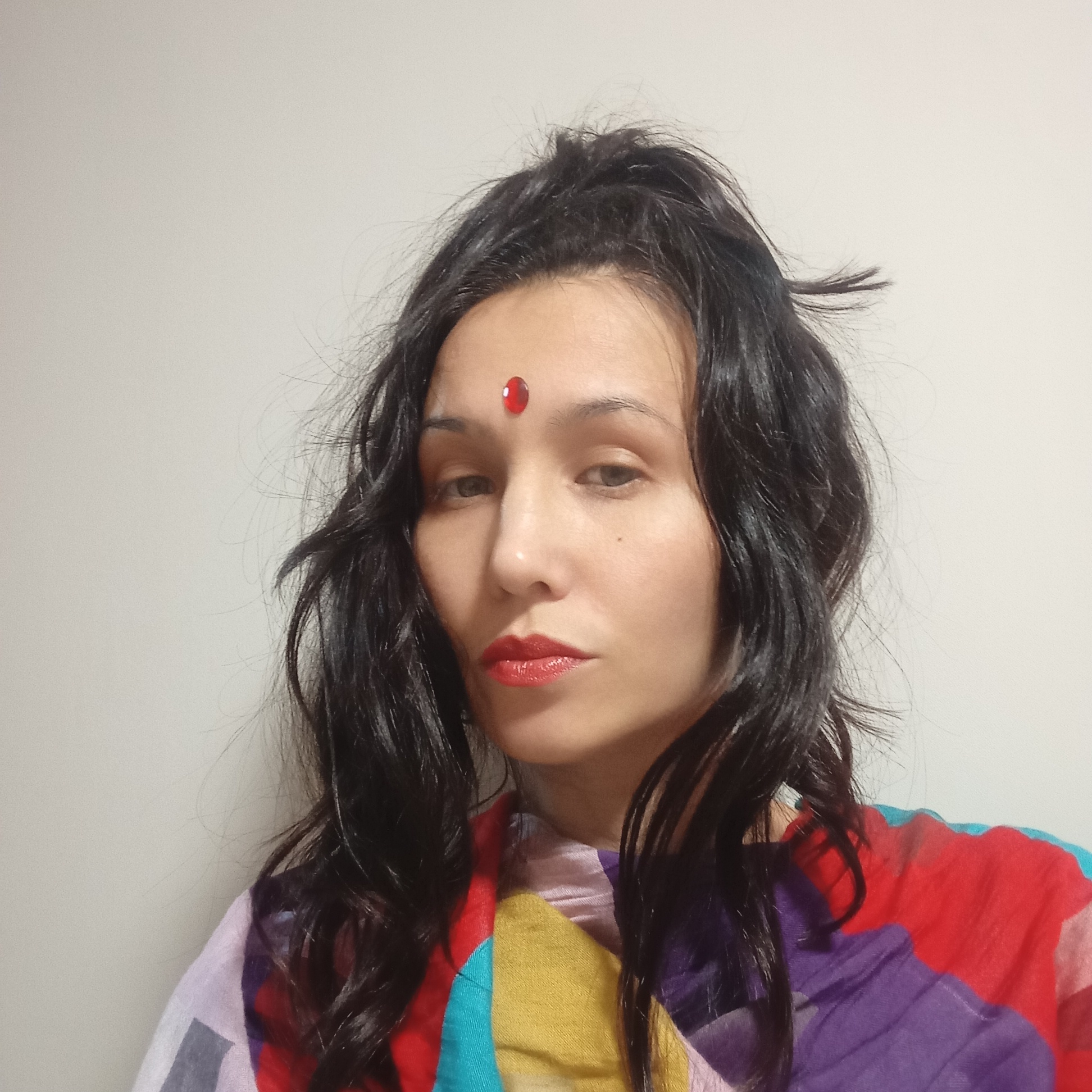 Woman photographed indoors in Pervomaysky, Russia
