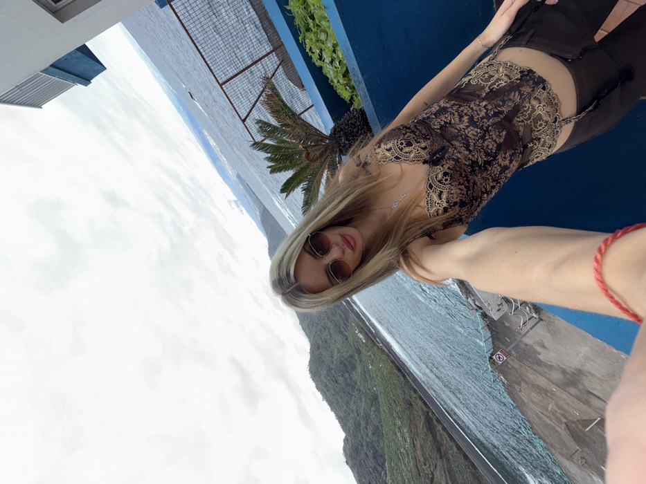 Woman Takes Selfies at Mesa Del Mar Coastal Viewpoint