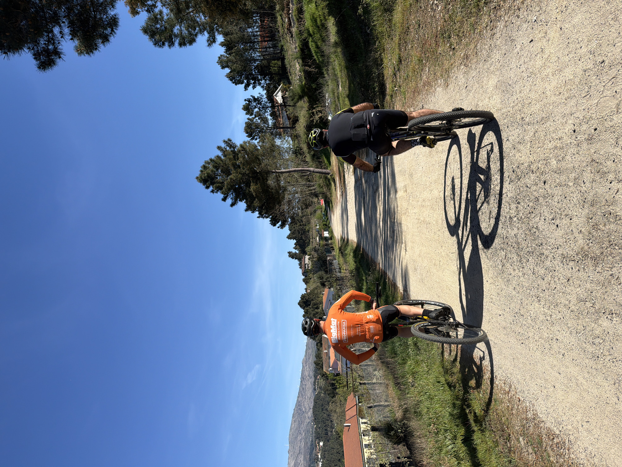 Cyclists navigate dirt path in Vila Real, Portugal