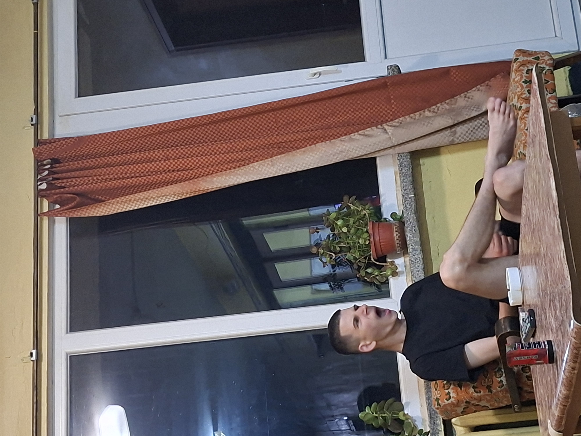 Young man relaxing at home in Pleven, Bulgaria