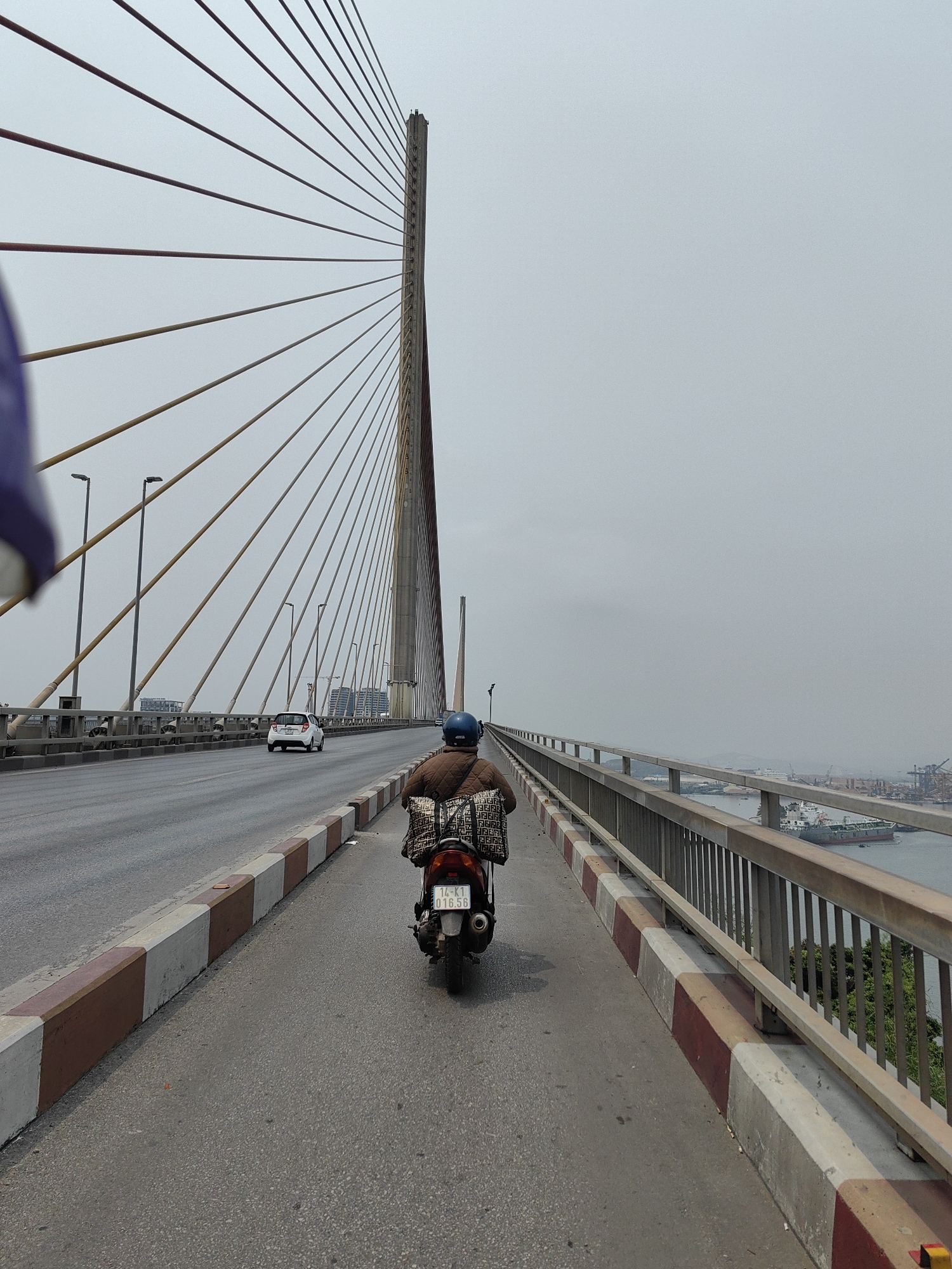 Morning commute captured on Bai Chay Bridge, Vietnam