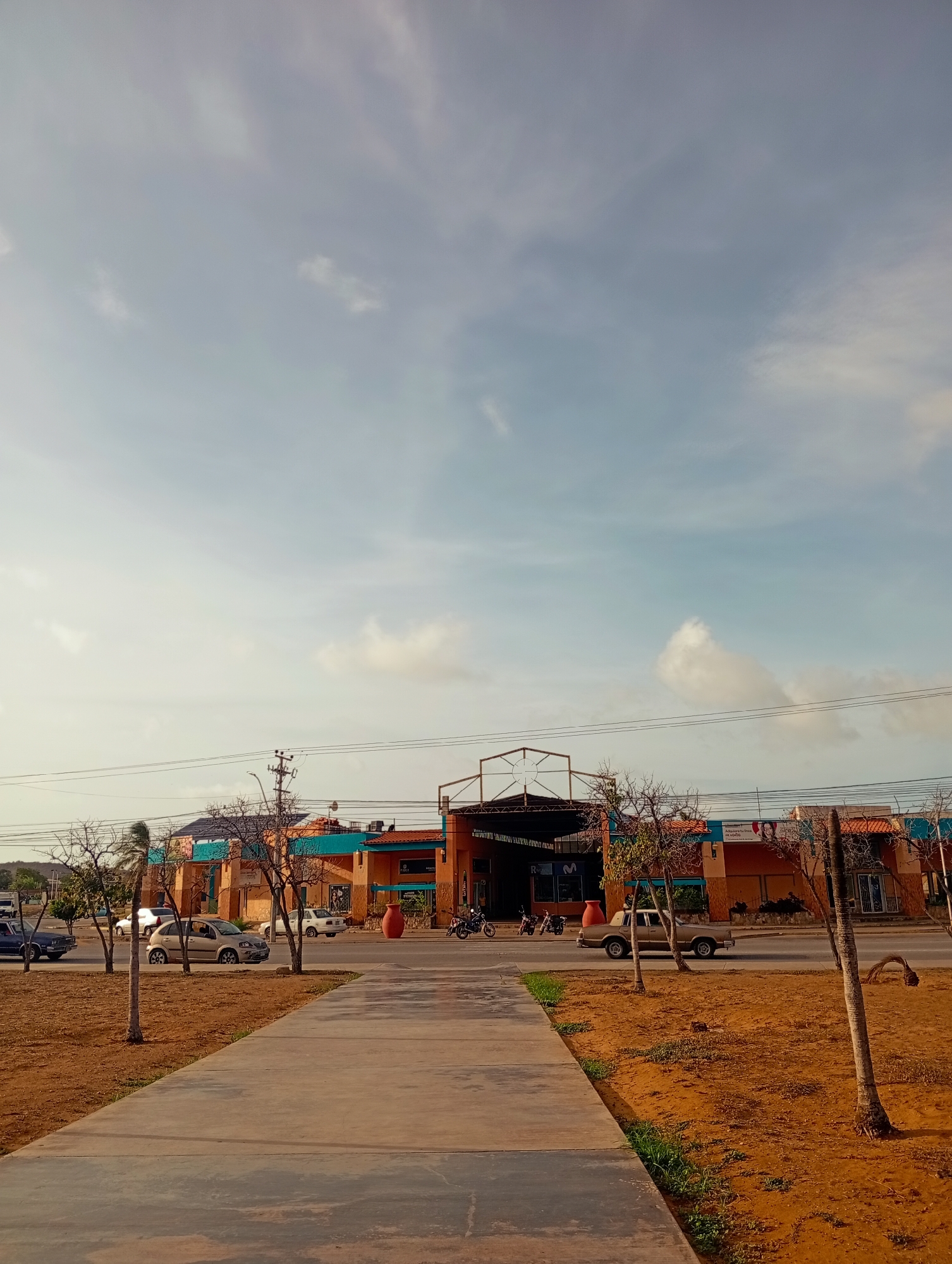 Evening around Juan Griego: supermarket run, waterfront dusk, local streets