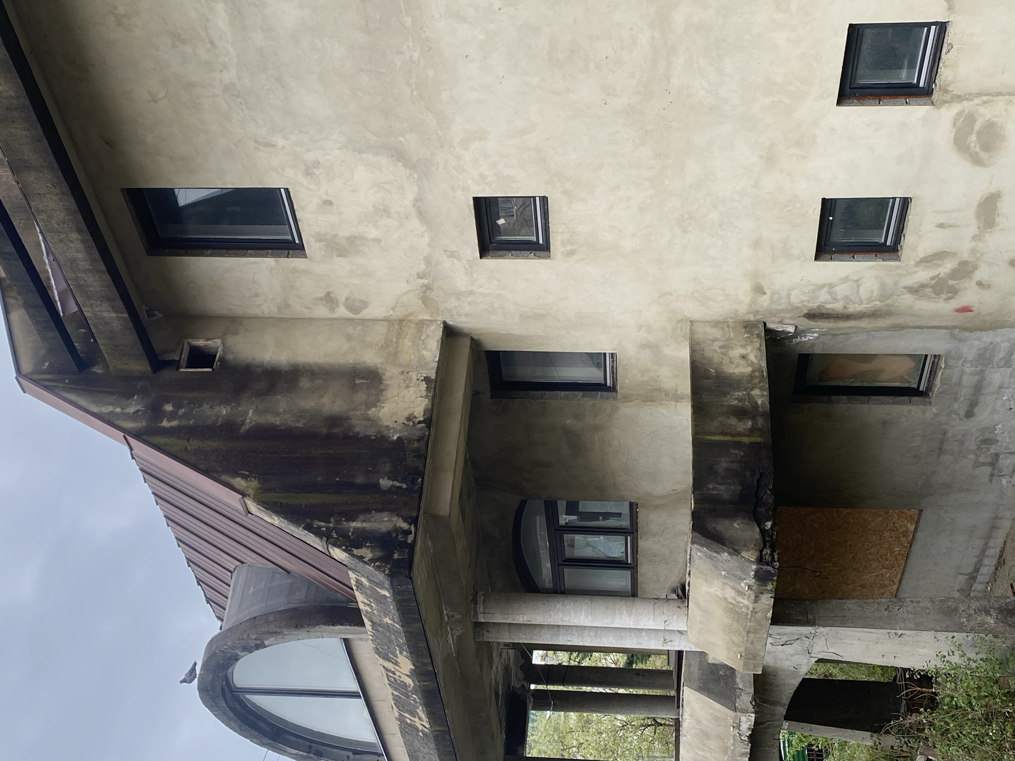 Child photographed at concrete residential buildings in Sochi, Russia