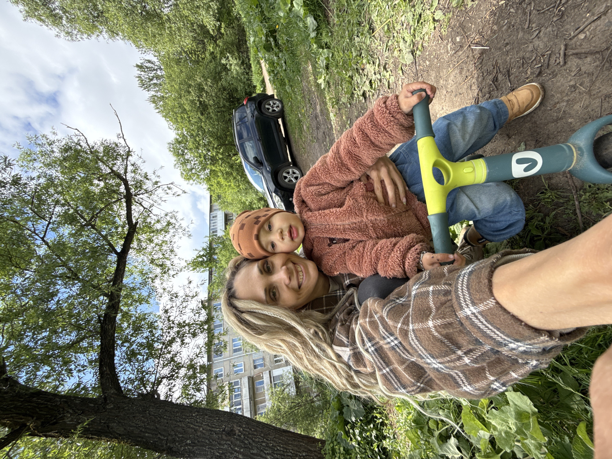 Woman and child photographed together outside in Rusanovo, Russia