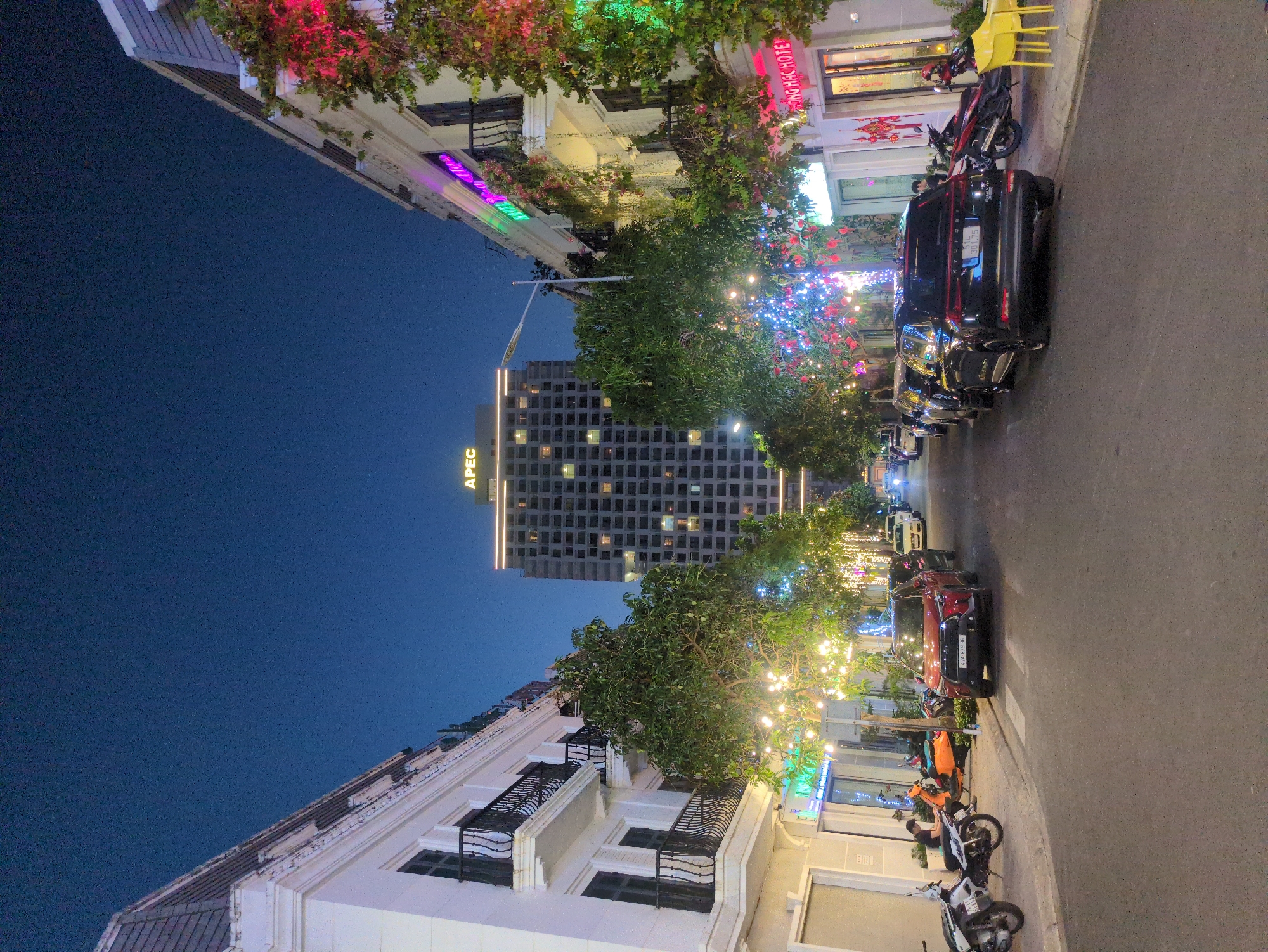 Nighttime street scenes documented in illuminated Tuy Hòa, Vietnam