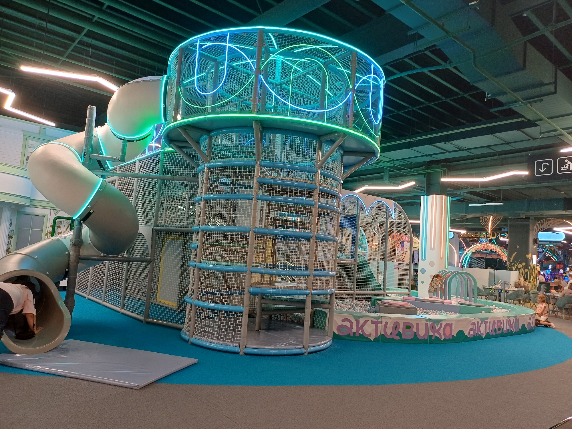 Inside a kids' play venue with dining next door