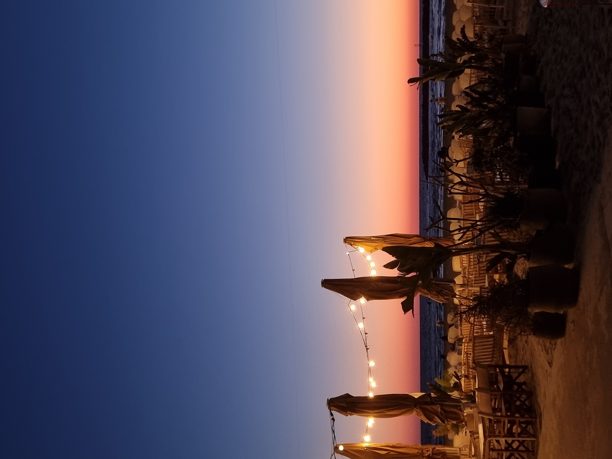 Sunset dining scene captured at Tel Aviv restaurant