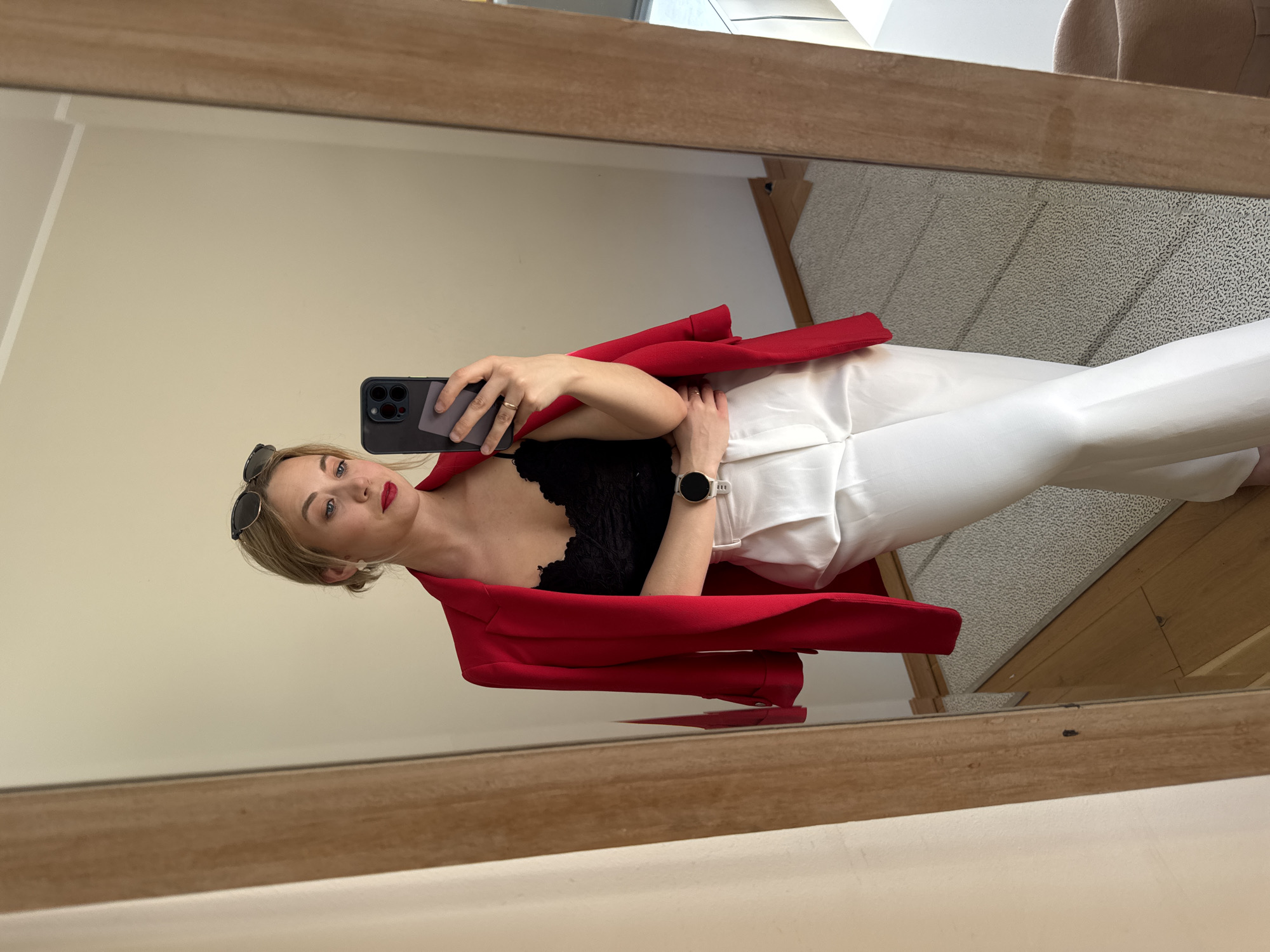 Woman takes mirror selfies in Riga apartment
