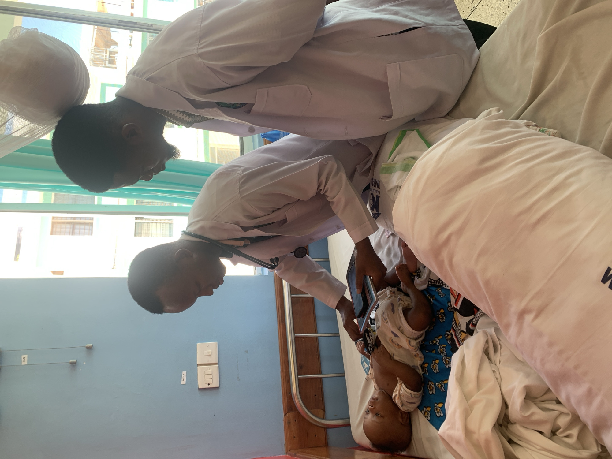 Healthcare worker photographed in Dar es-Salaam medical facility