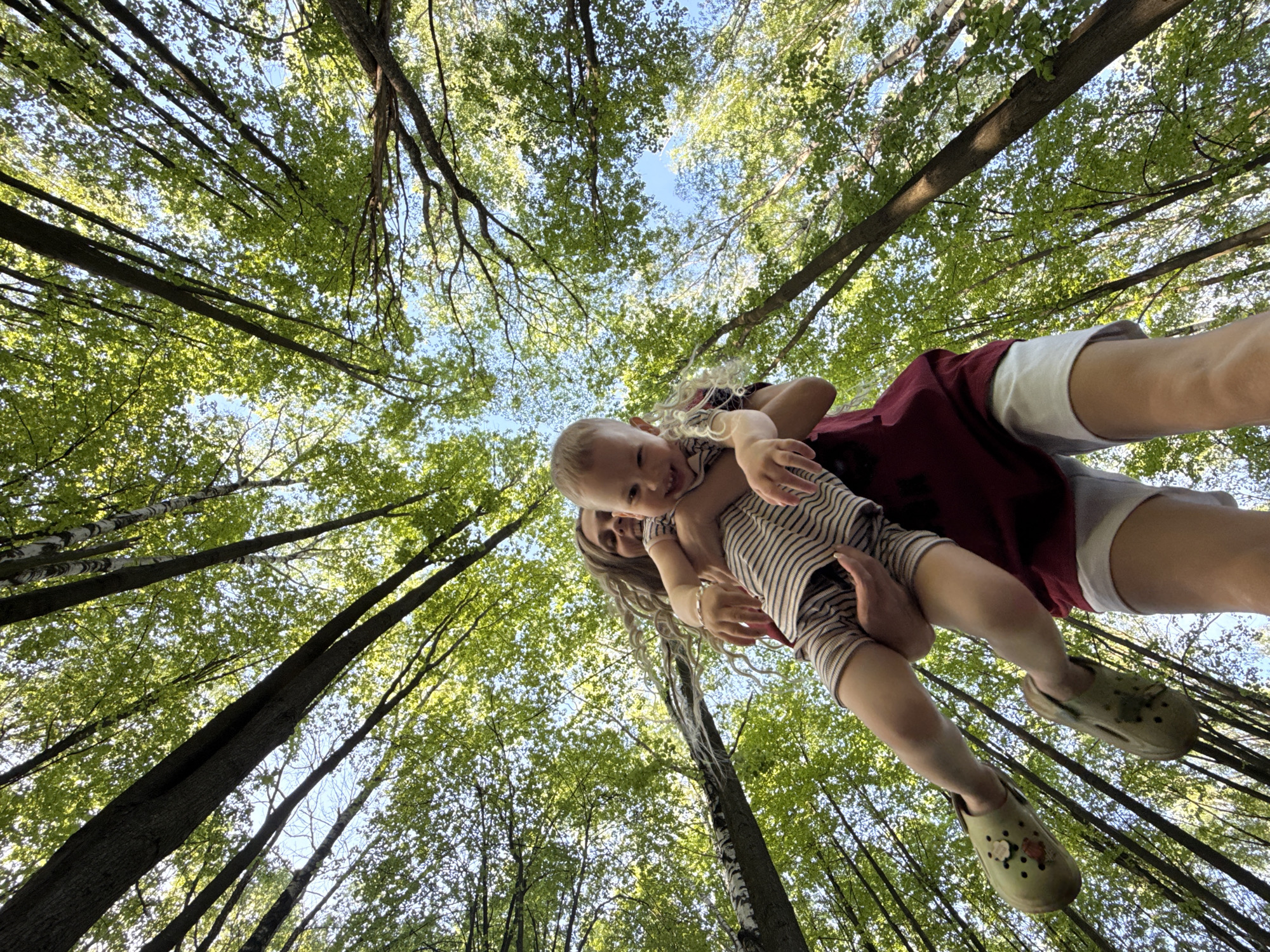 Woman with baby photographed in Russian forest