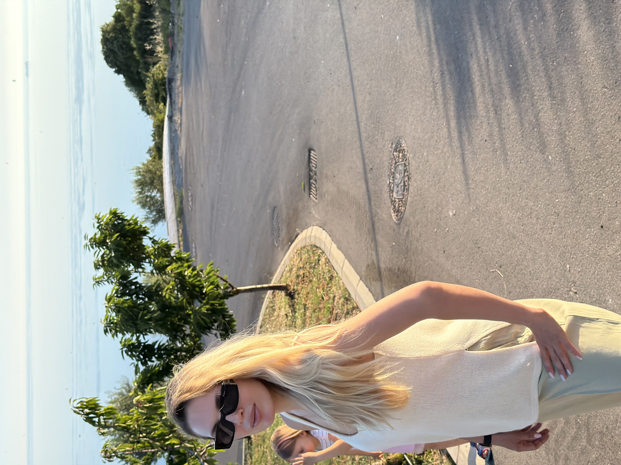 Mother and daughter enjoy sunset coastal visit in Montenegro