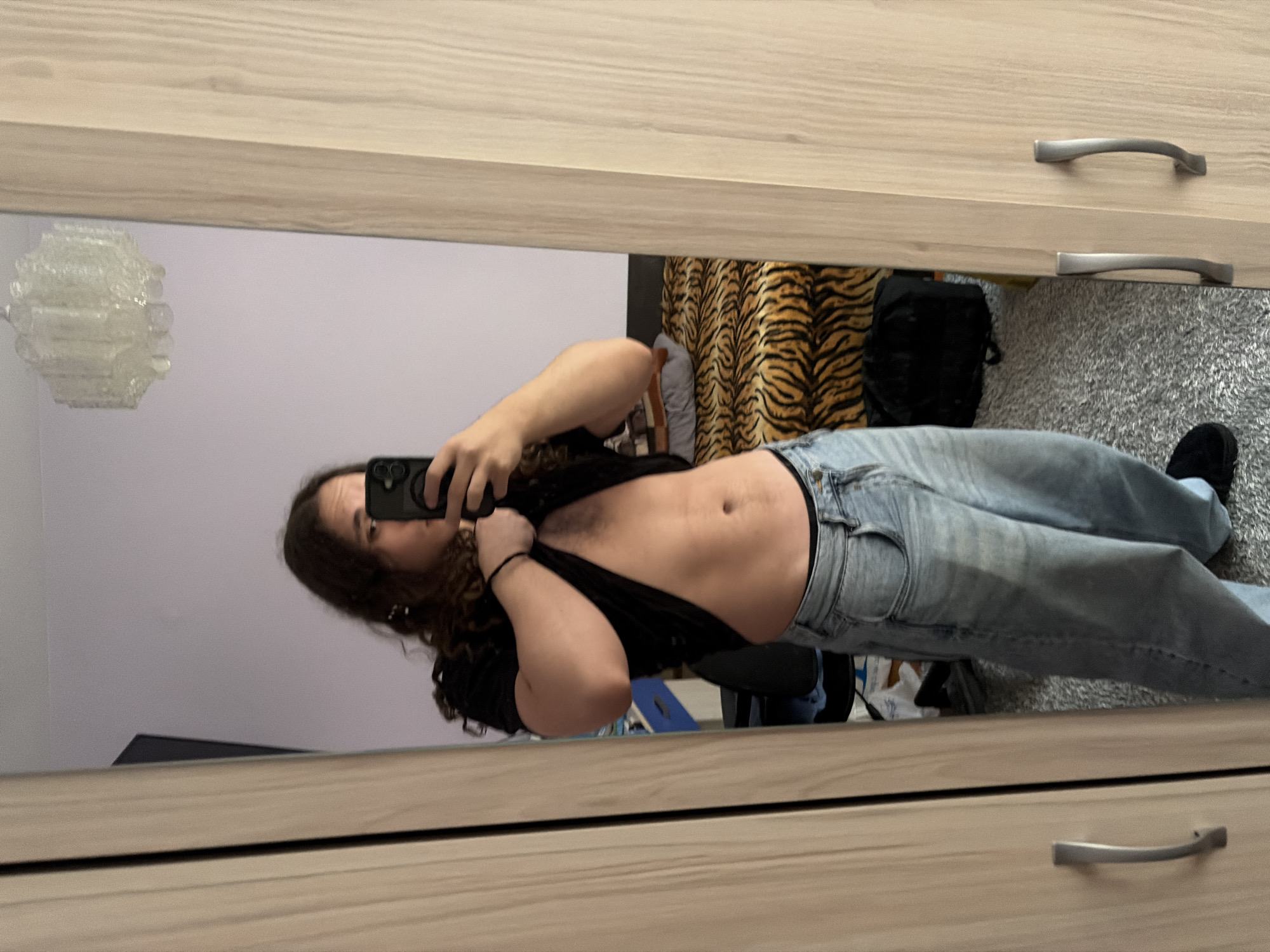 Mirror selfie captured in Asenovgrad indoor setting