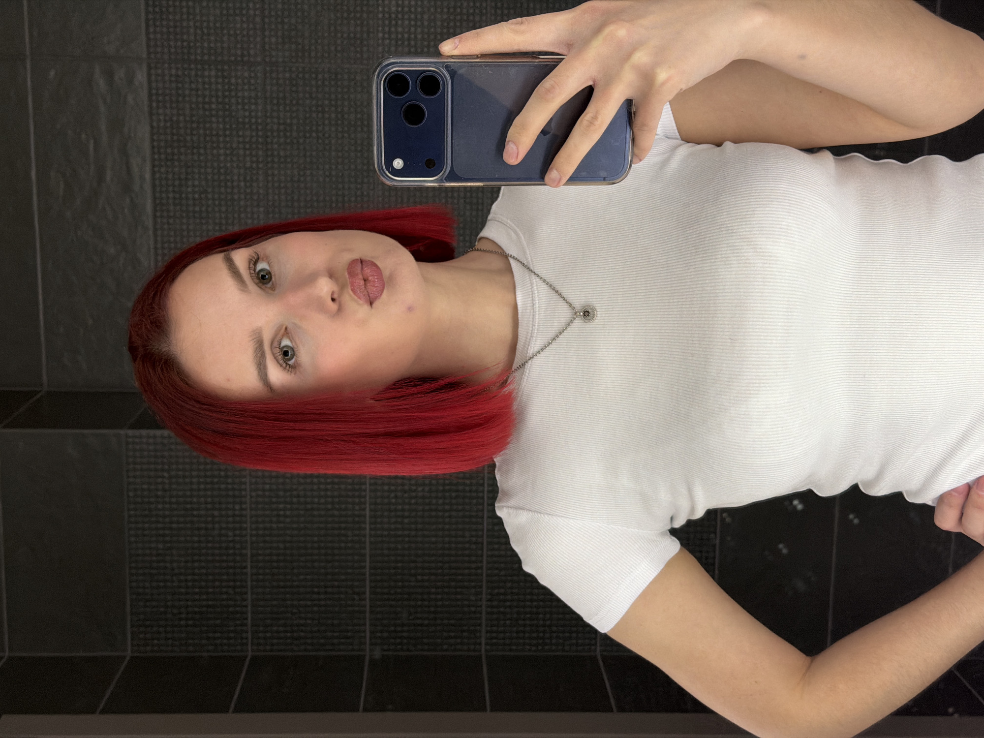 Woman takes bathroom selfie in Chaikovsky, Russia