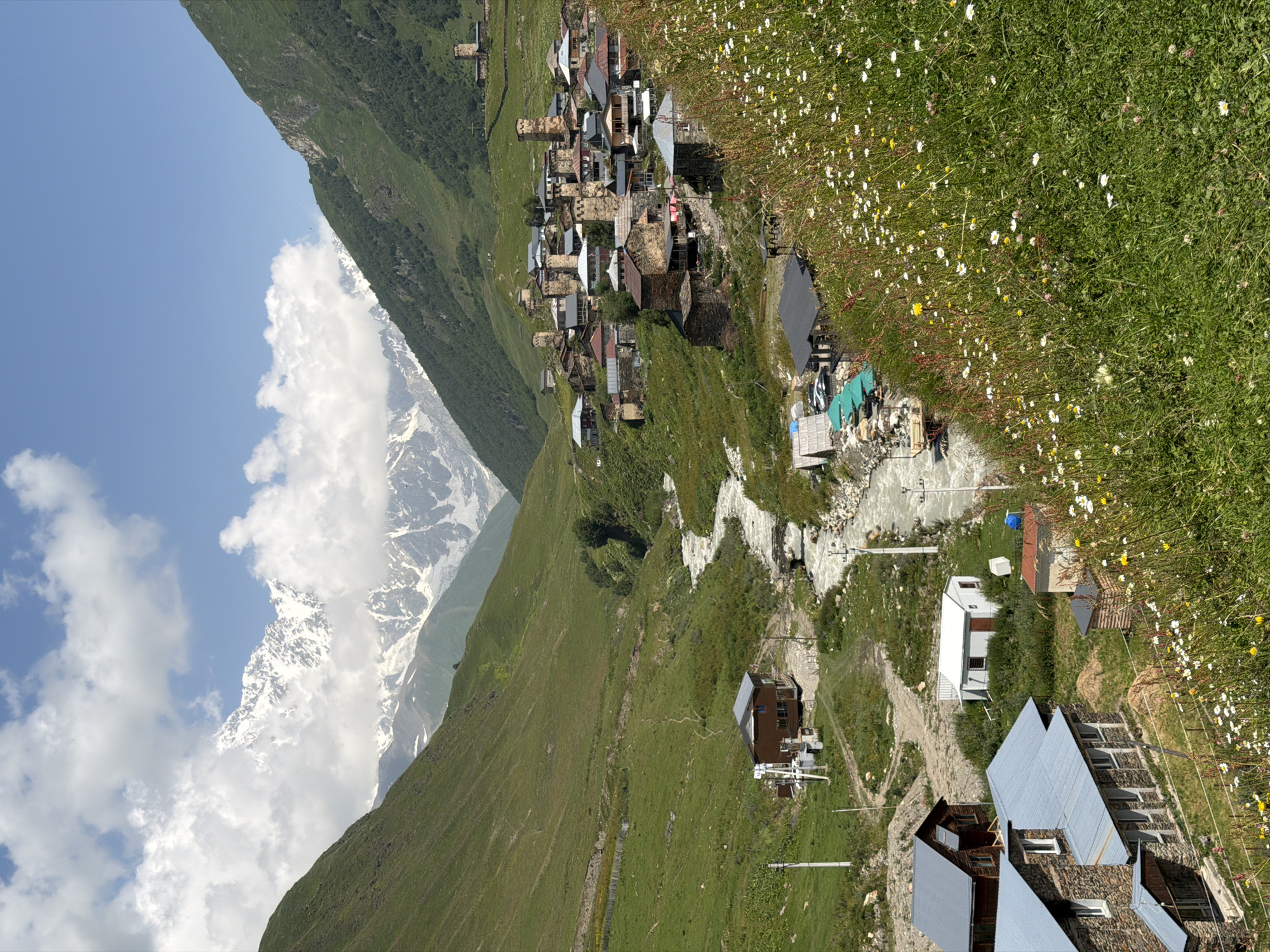 Ushguli's medieval stone towers in the high Caucasus, summer morning