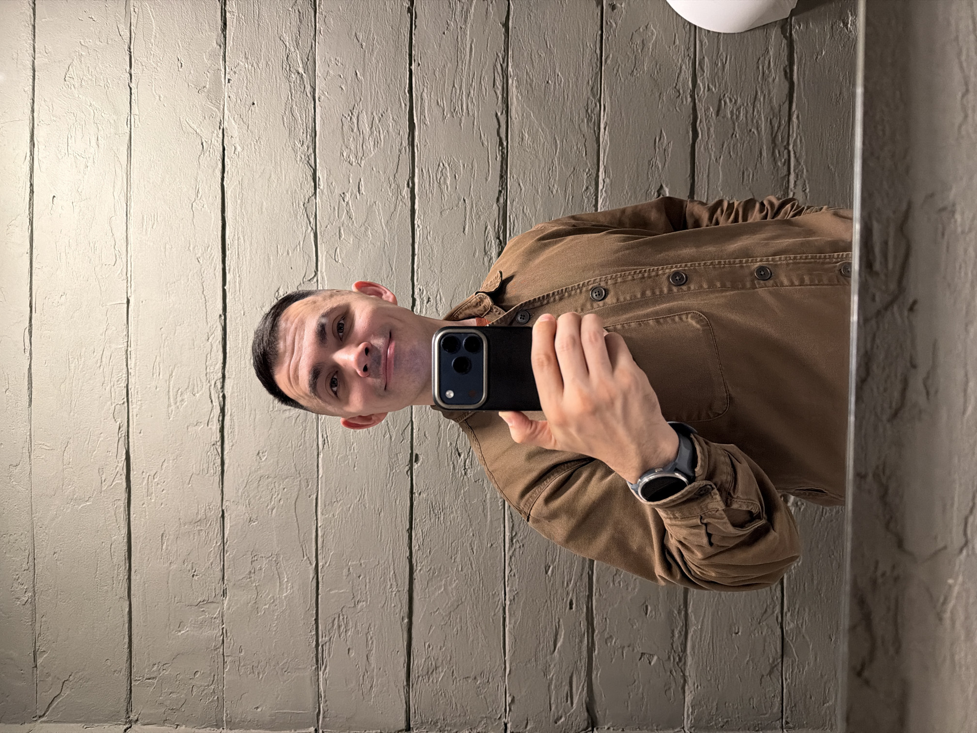 Man takes mirror selfies in Izhevsk apartment
