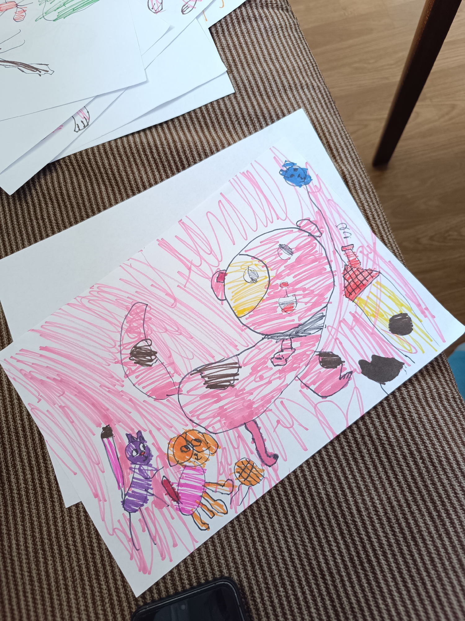 Children's artwork and everyday items documented over morning hours