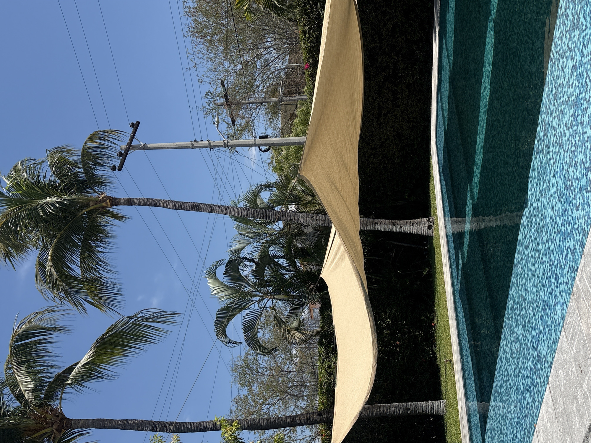 Poolside relaxation scene captured in Puerto Escondido, Mexico