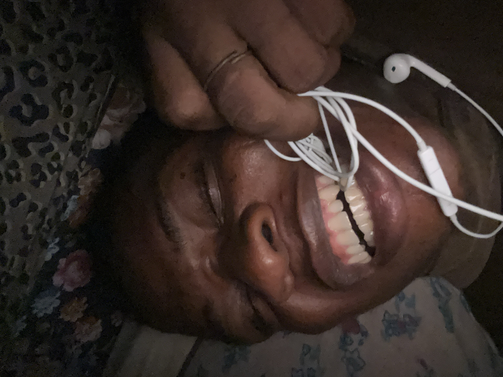 Person rests with tangled earphones at location 666