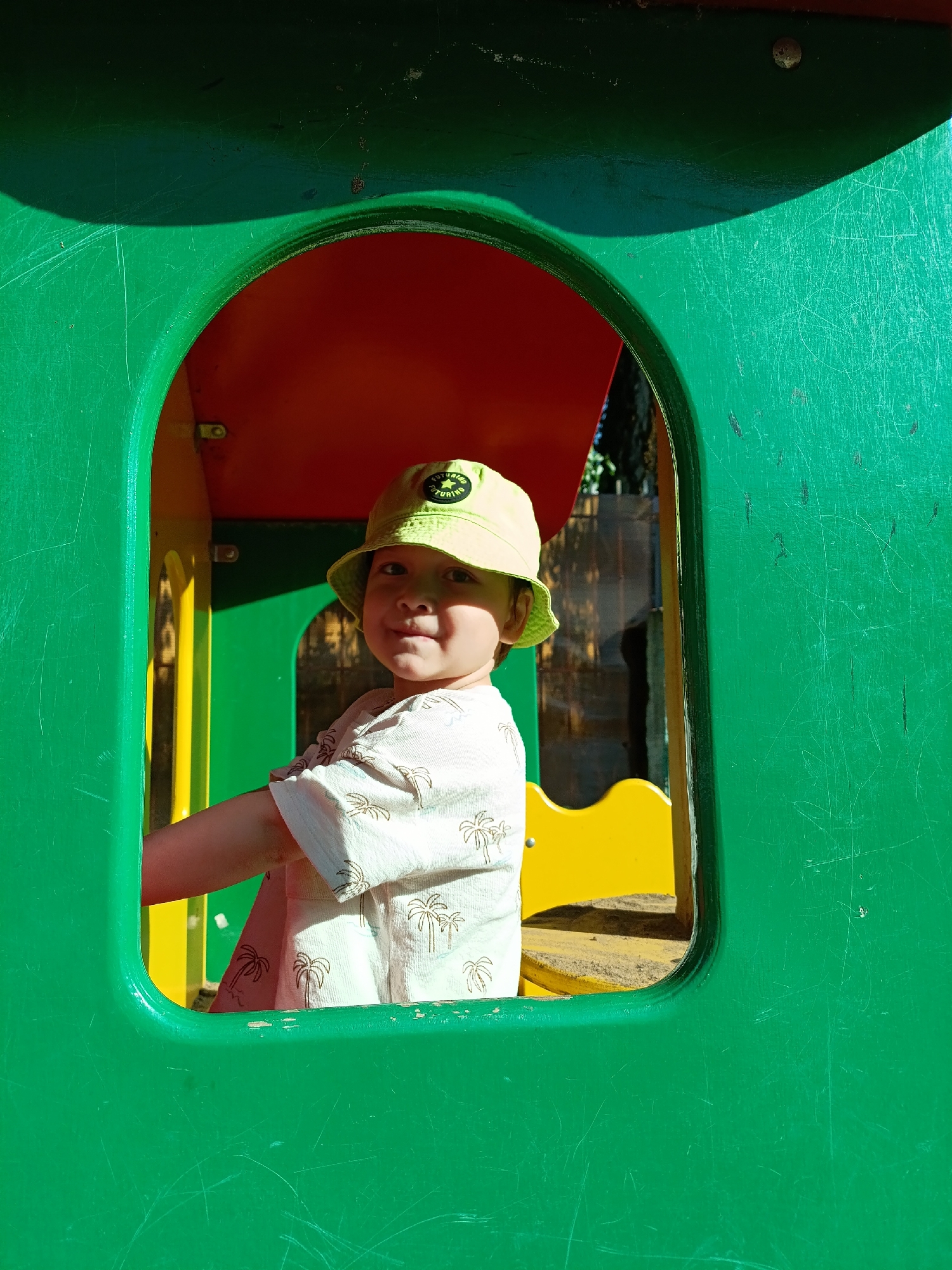 Child plays at playground in Chaikovsky, Russia