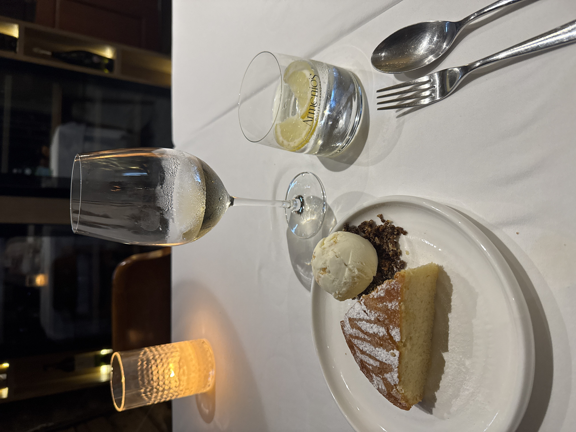Dessert and drinks at a candlelit Bangkok restaurant