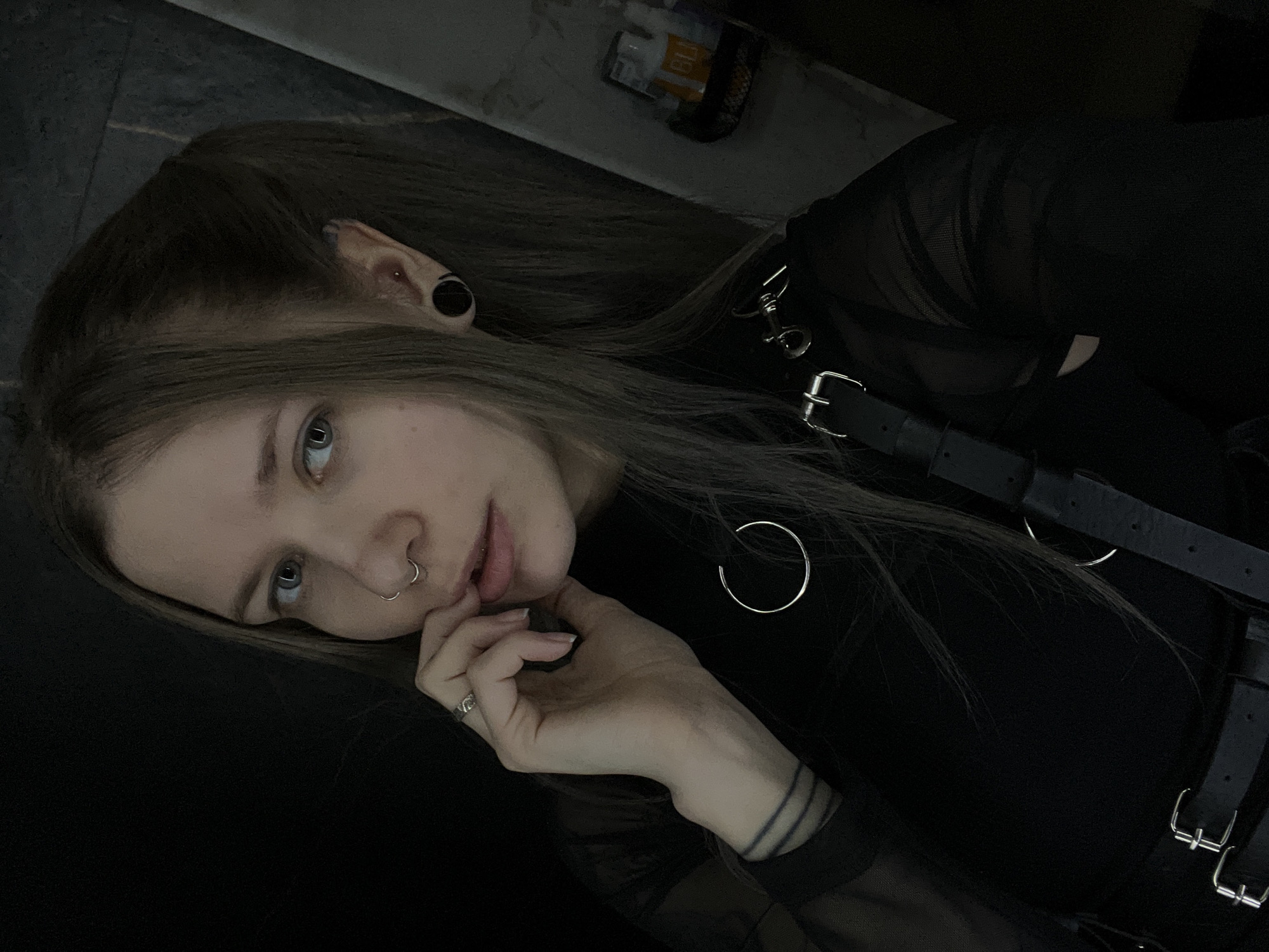 Person with piercings observed resting in Khimki, Russia