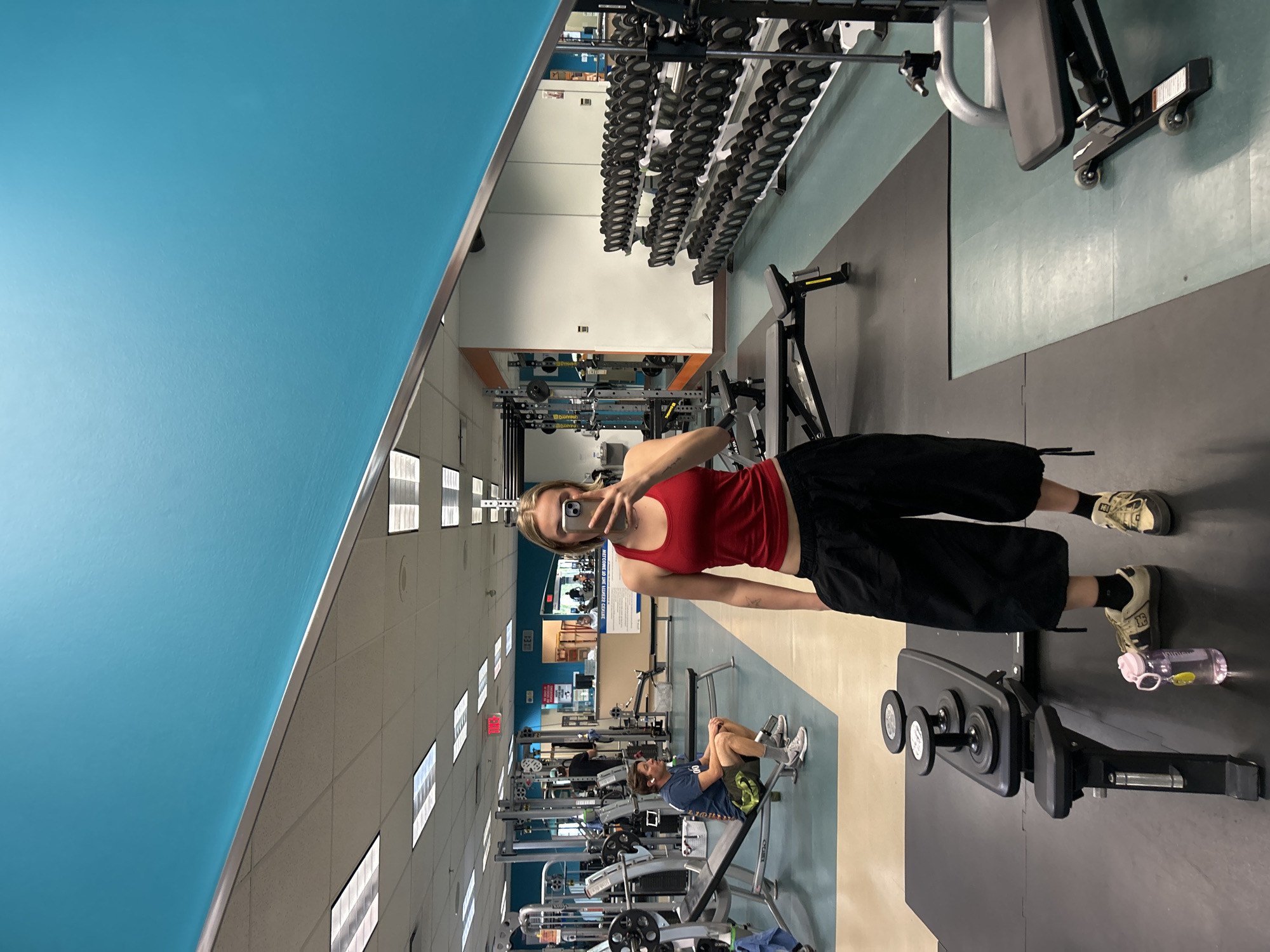 Woman takes mirror selfie at Whistler gym