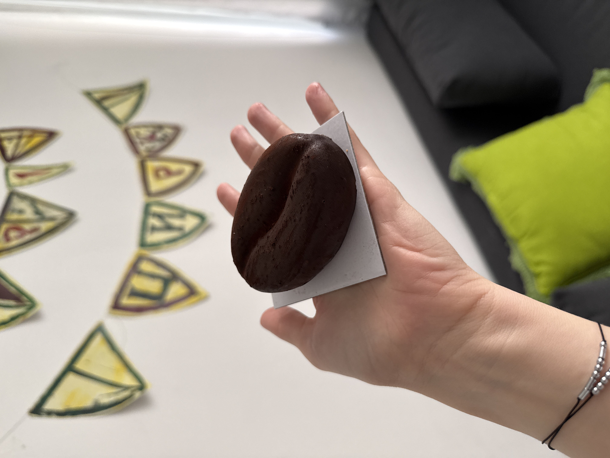 Person displays confections on paper squares in Ramat Gan