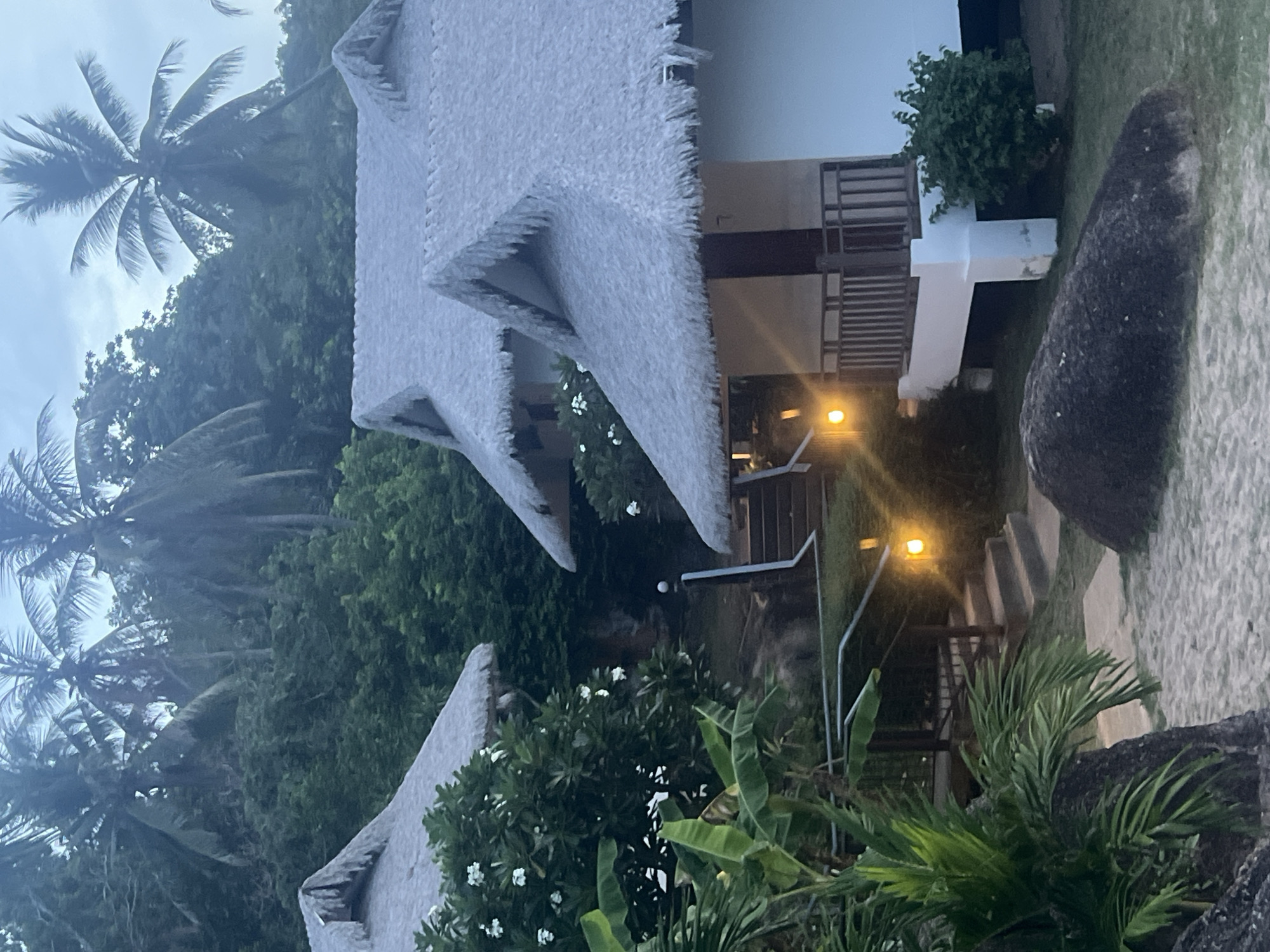 Ko Samui resort and rocky beach at dusk