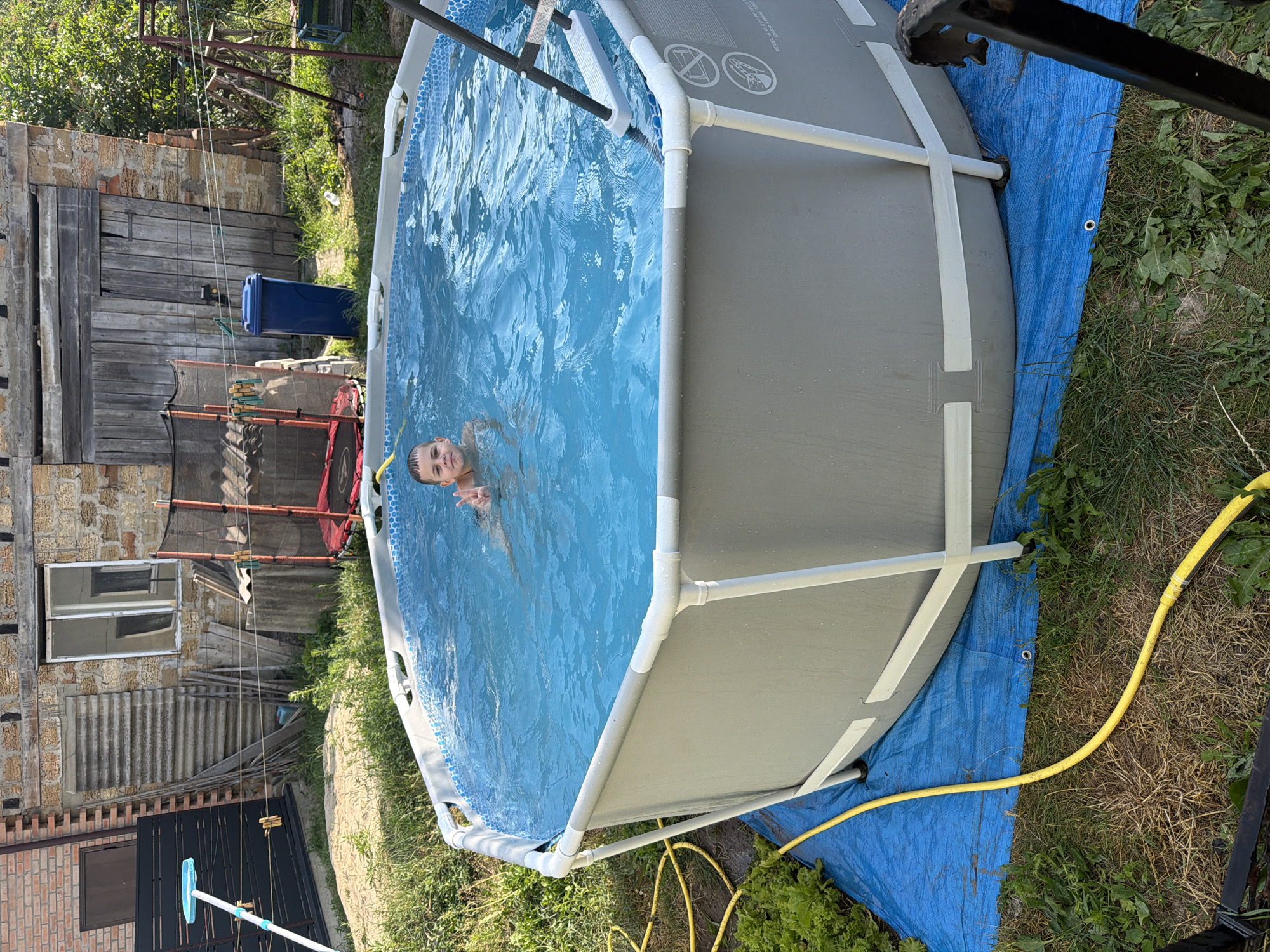 Backyard pool day with a rabbit and aquarium check-in