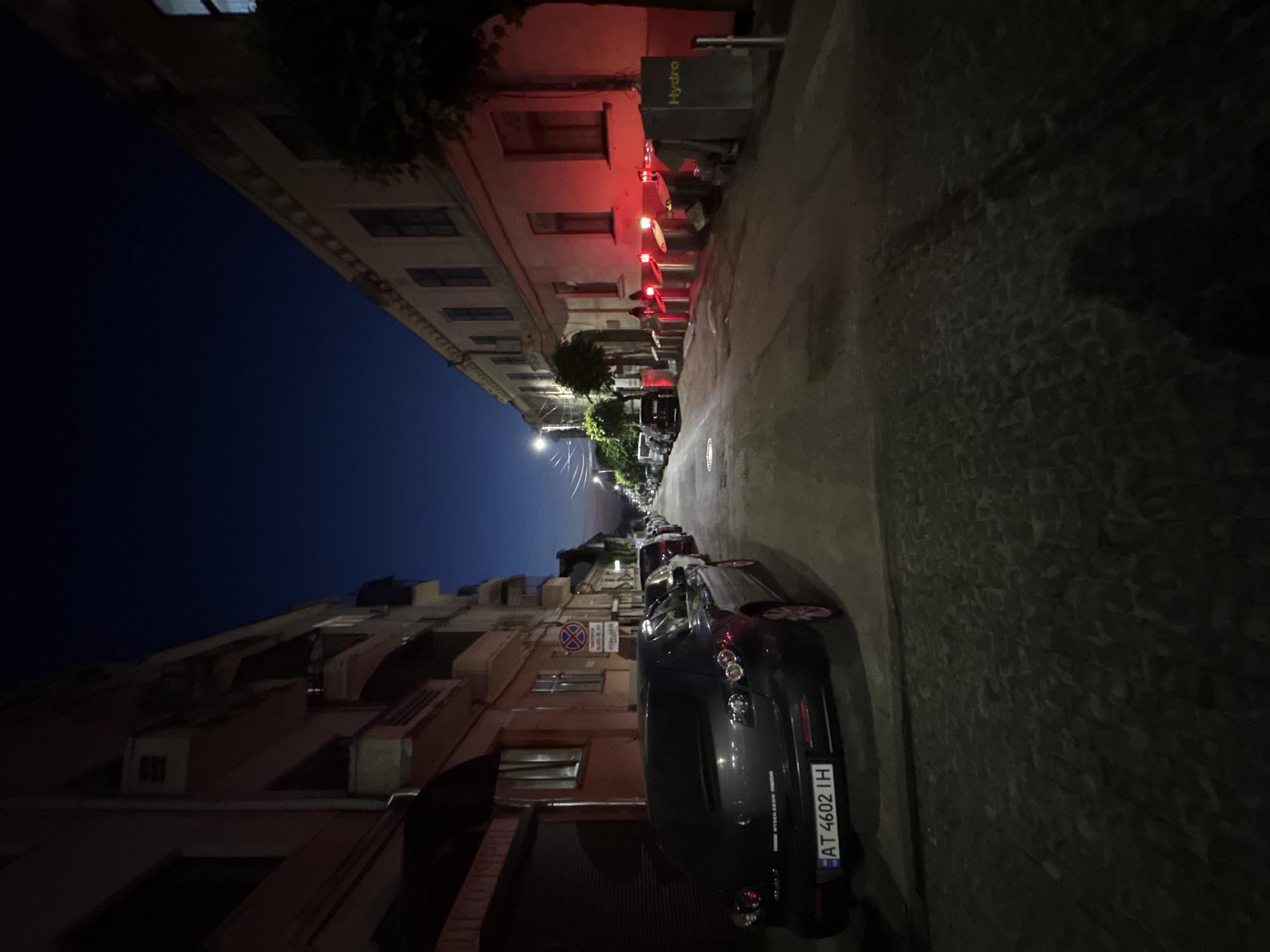 Evening streets of central Chernivtsi, bollards and landmarks lit up