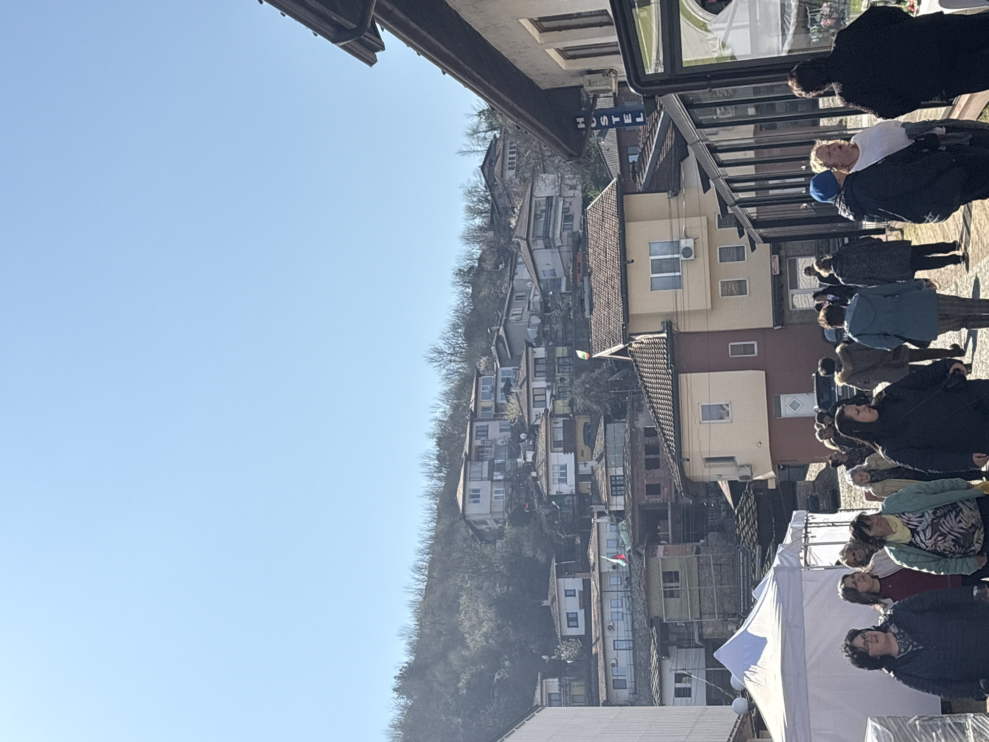 Crowd gathers on street in Lovech, Bulgaria