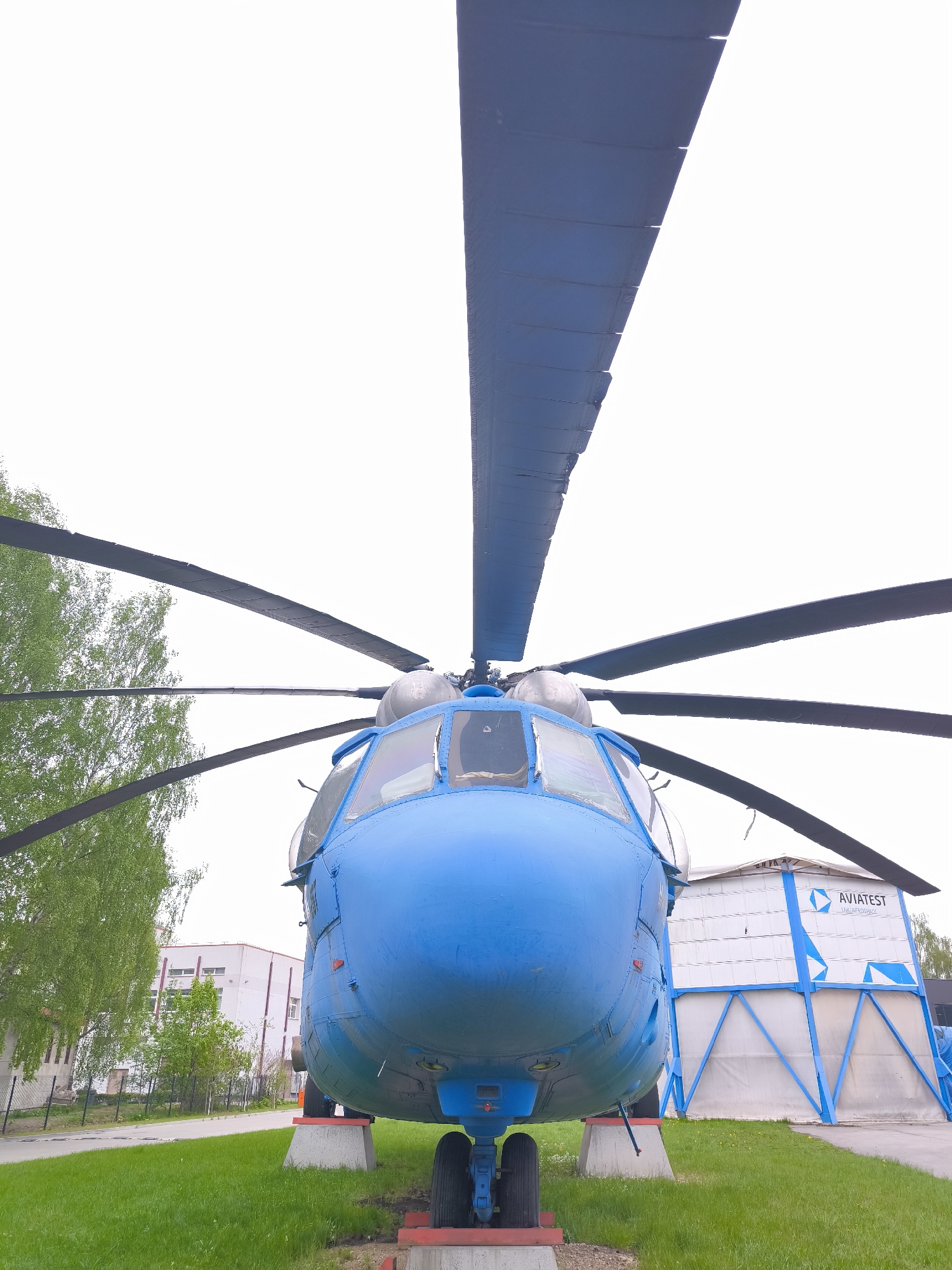 Blue transport helicopter spotted parked in Riga with AVIATEST markings