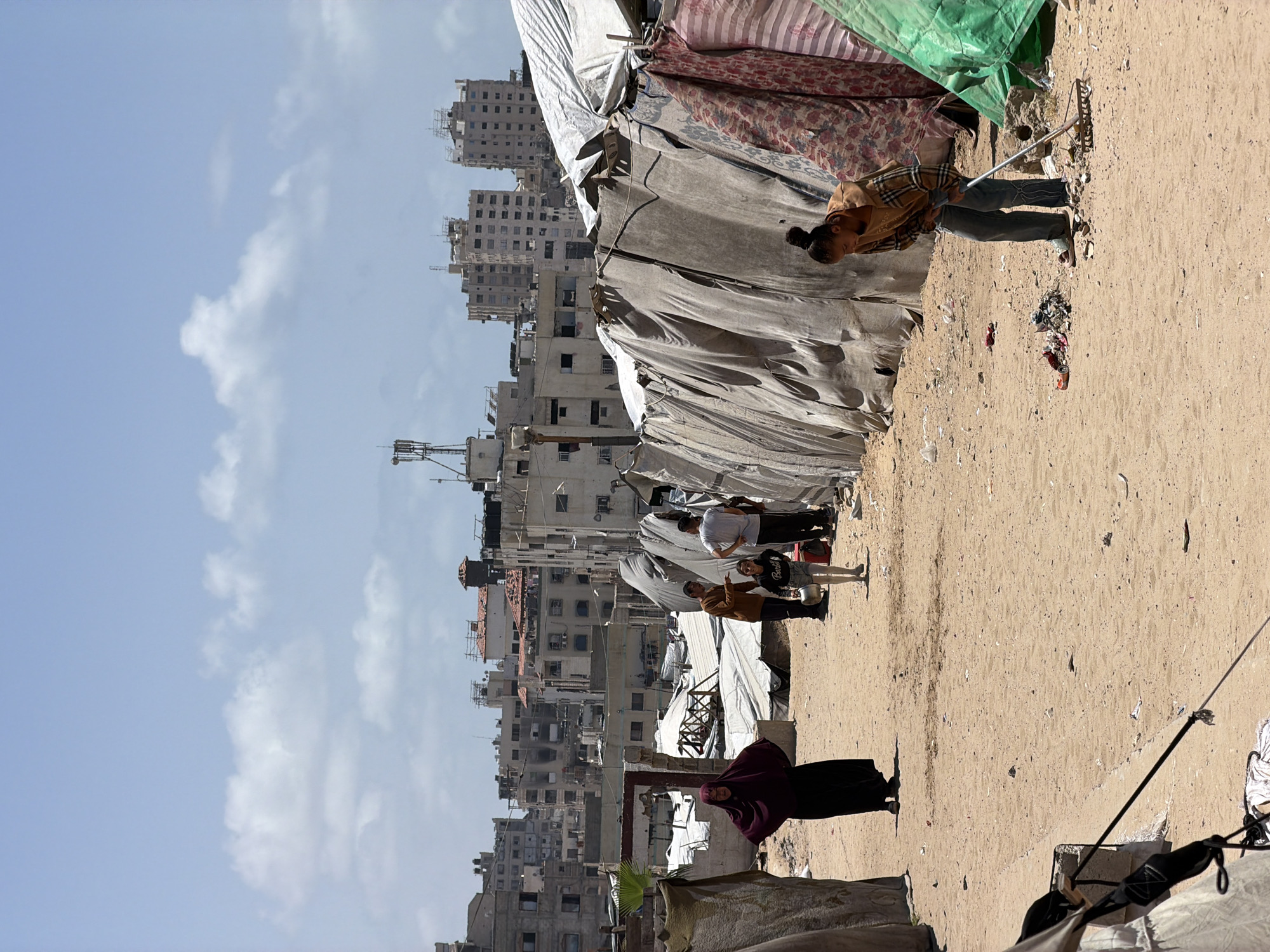 Witness documents damaged buildings, makeshift shelters in Gaza