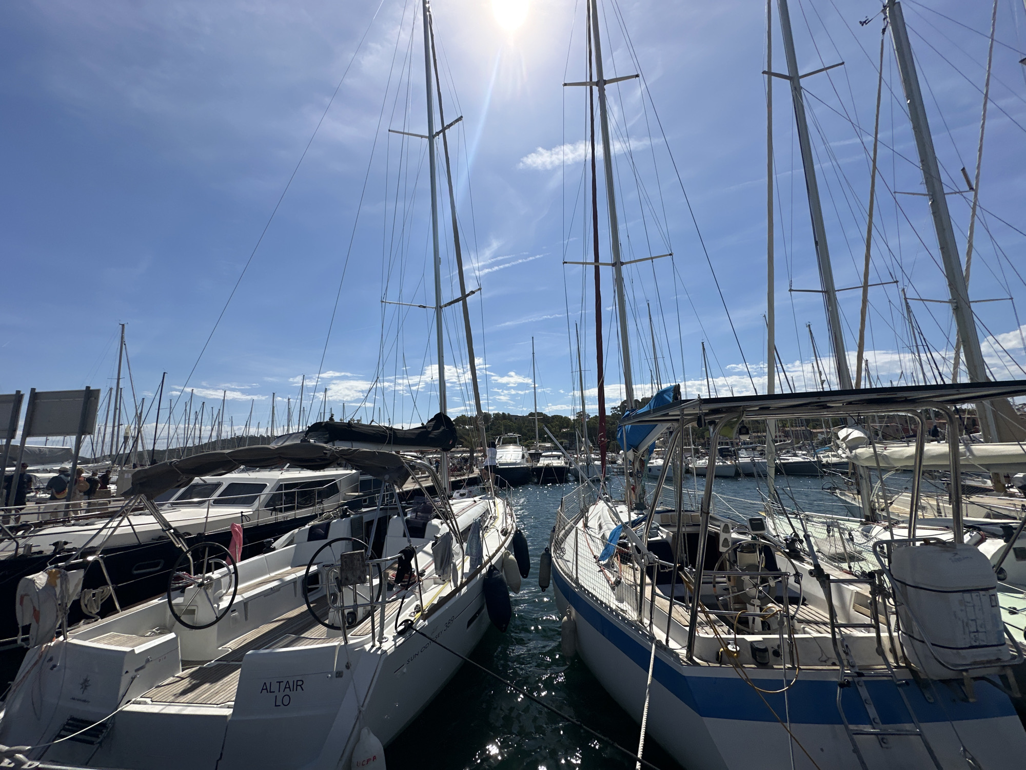 Sunny morning captures busy sailboat marina in Hyères, France