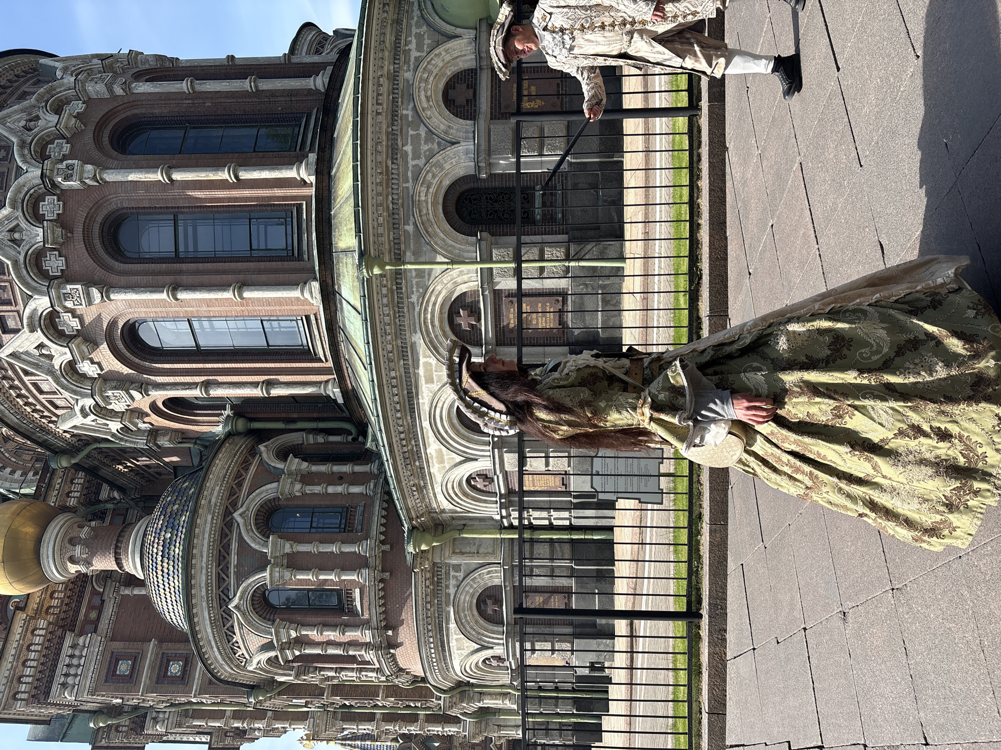 Street musicians, costumed performers enliven Saint Petersburg church square