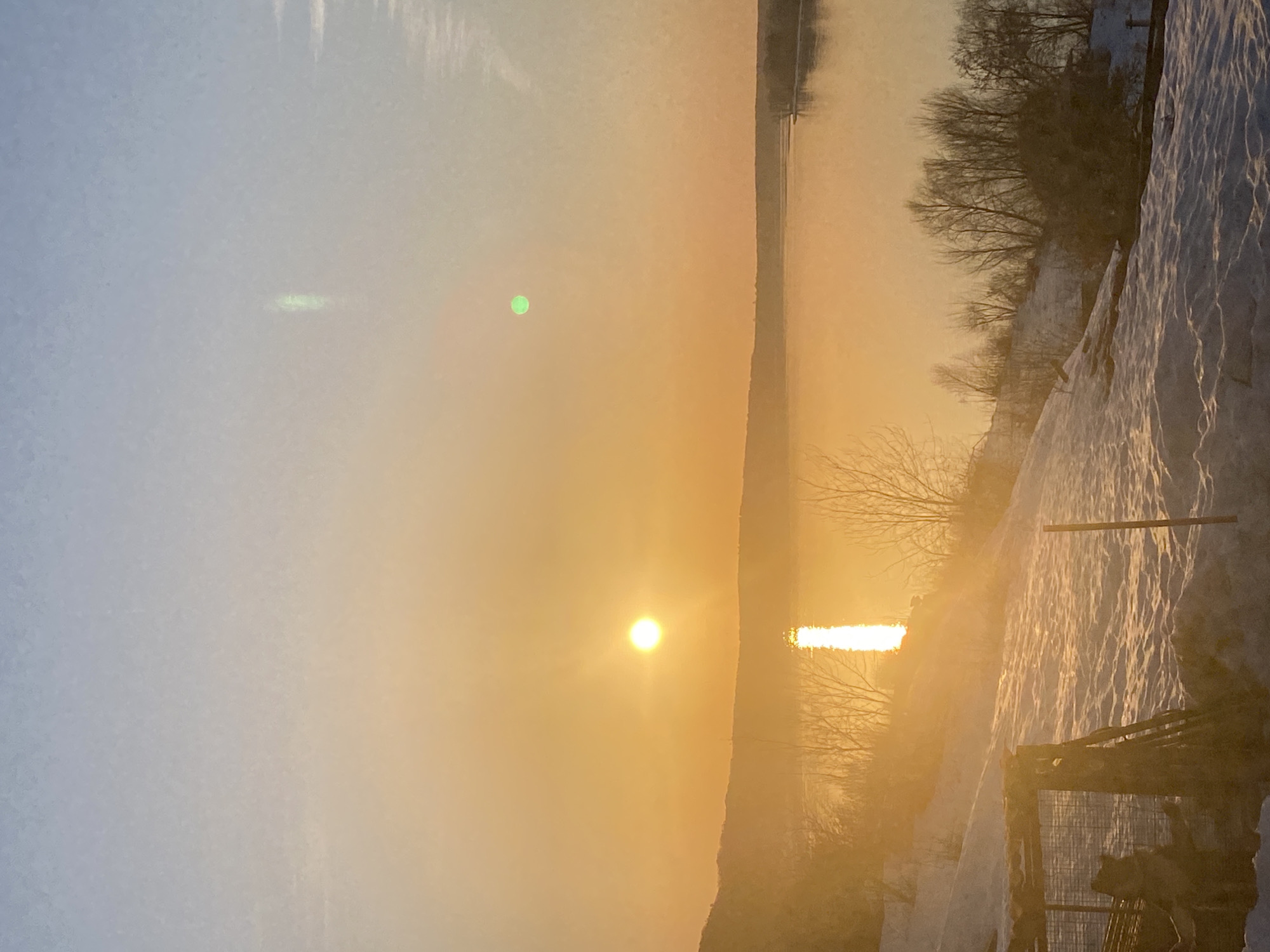 Winter life scenes captured in Russian village during sunset
