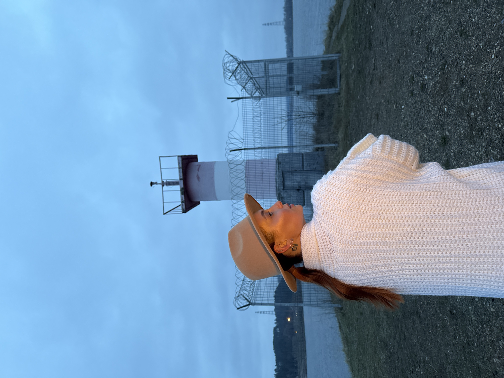 Person spotted by water in Chaikovsky under overcast skies