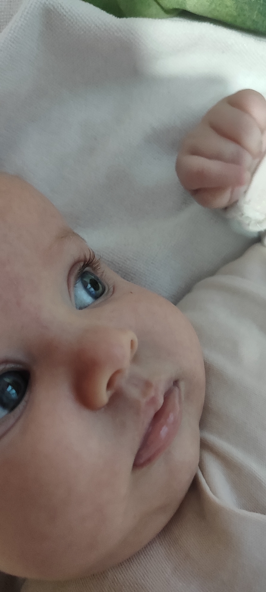 Baby photographed in close-up portrait in Novopetrovka, Russia