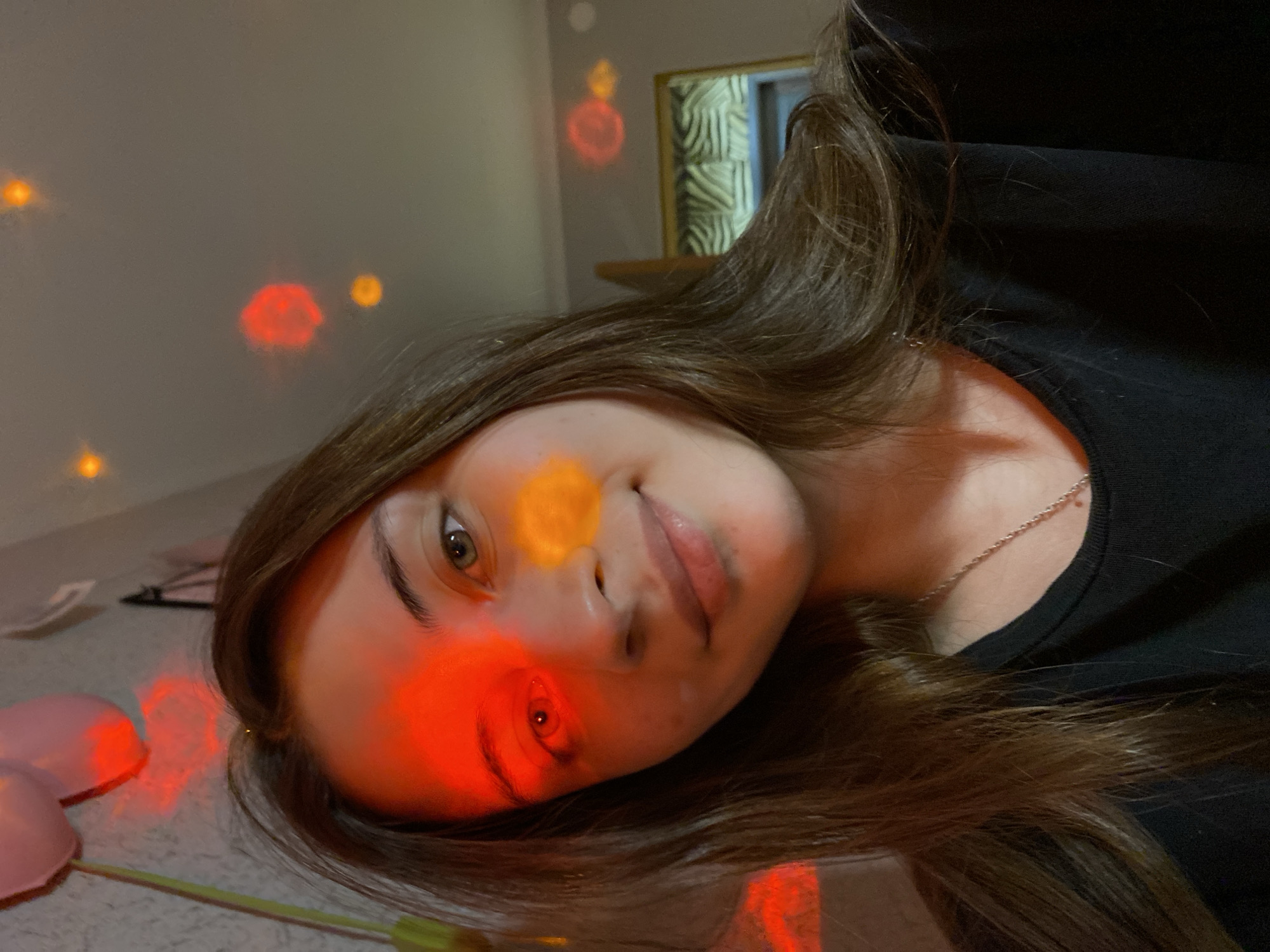 Woman takes colorful disco-lit selfies in Votkinsk apartment