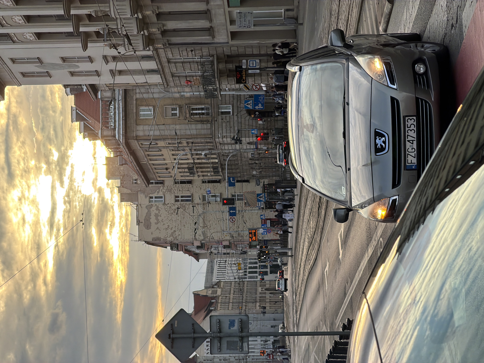 Evening street life in a European city, people and places