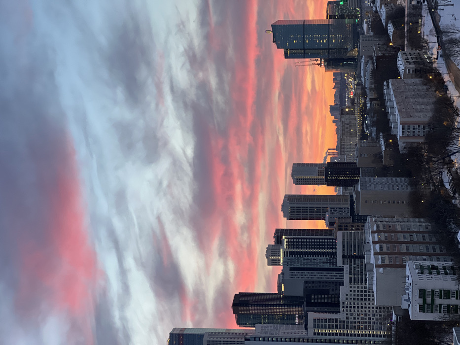 Vibrant sunset illuminates Khimki skyline, witnesses capture colorful display