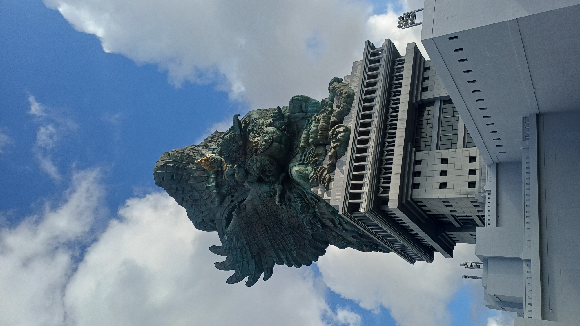 Tourist captures Garuda Wisnu Kencana statue from multiple angles