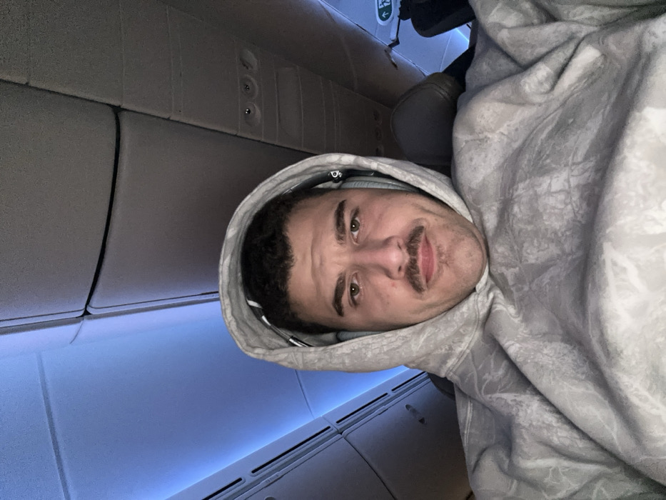 Passenger documents flight journey with selfies and aerial views