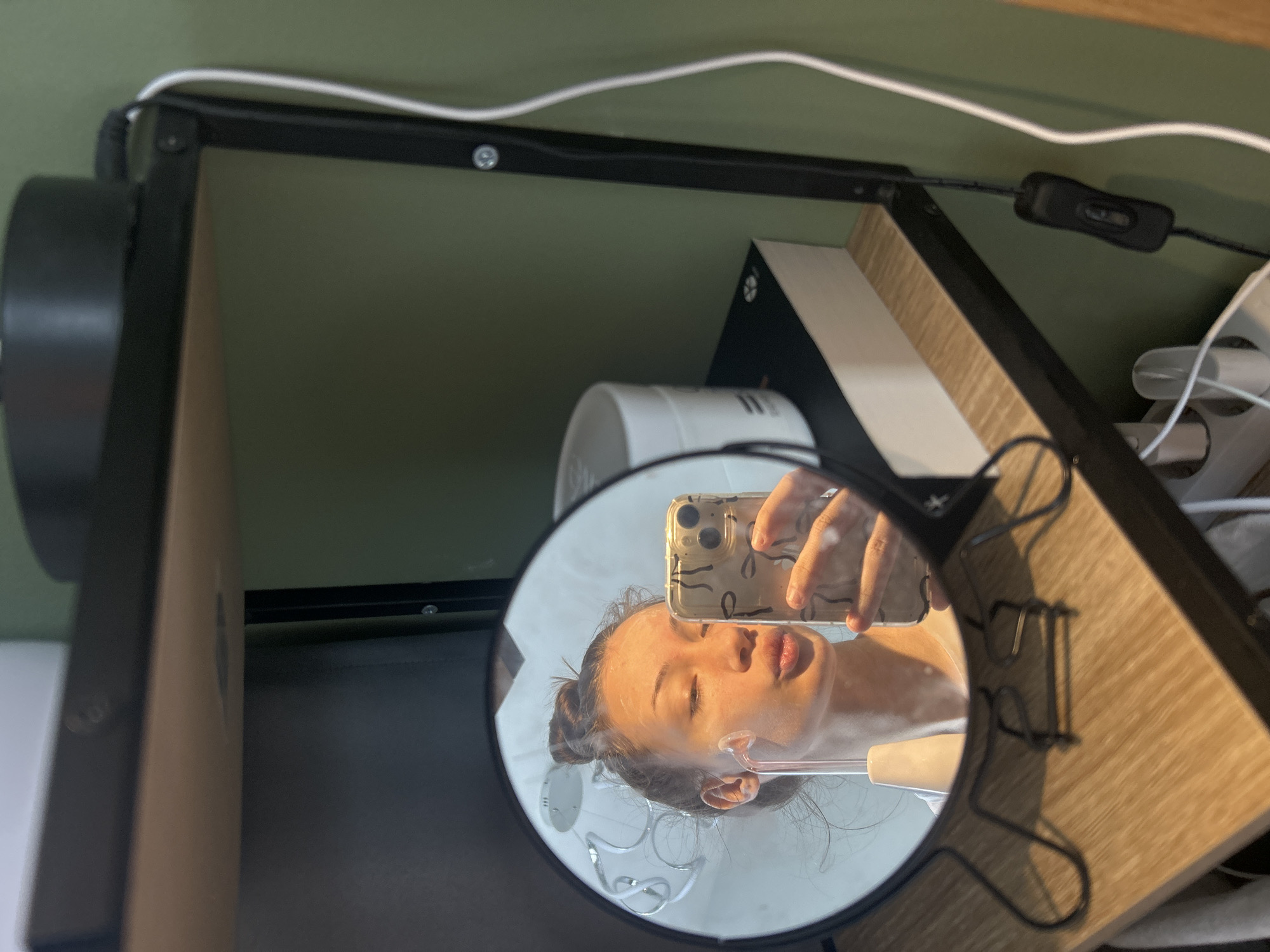 Woman documents morning skincare routine in Burgas mirror selfies