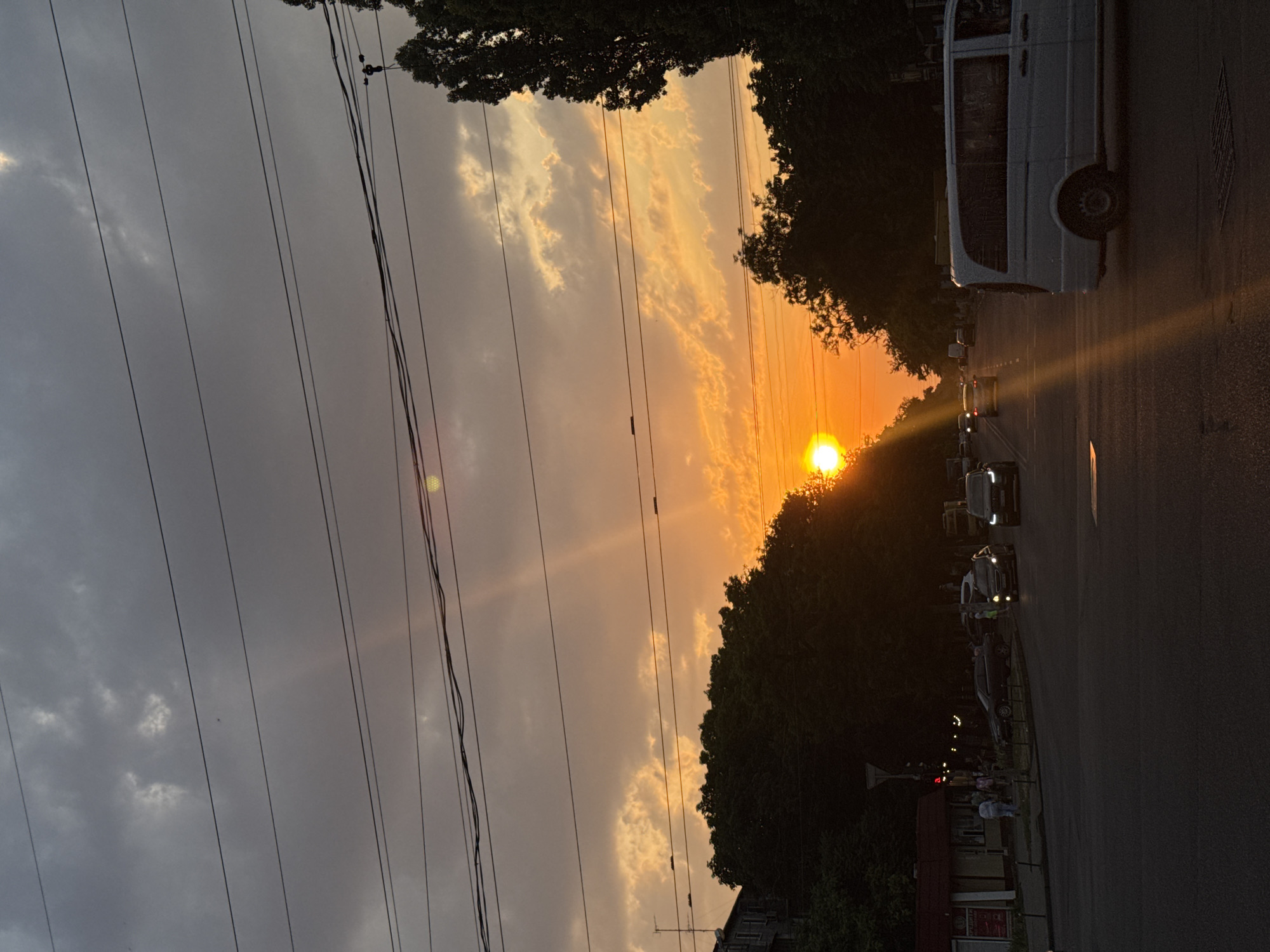 Golden sunset over Odesa, clouds lit in orange and pink