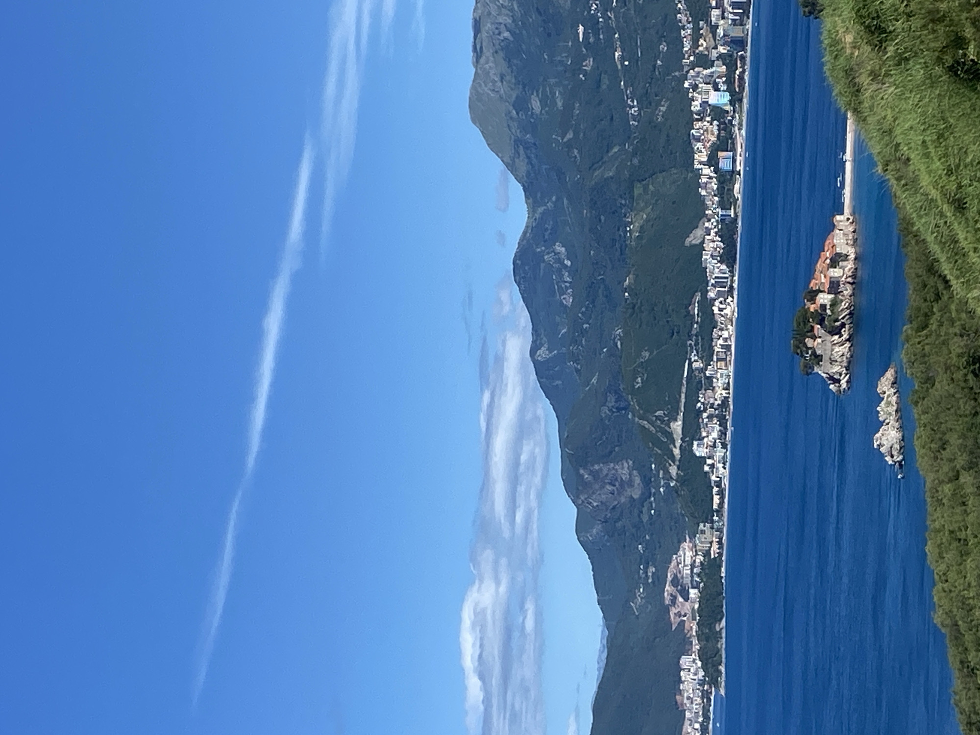 Scenic Budva coastline and mountains photographed on clear morning