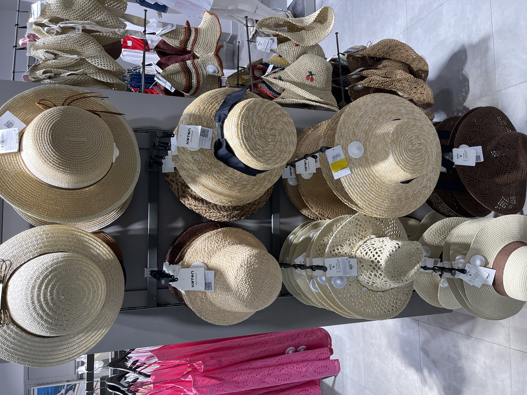 Shoppers browse summer clothing at Moscow retail stores