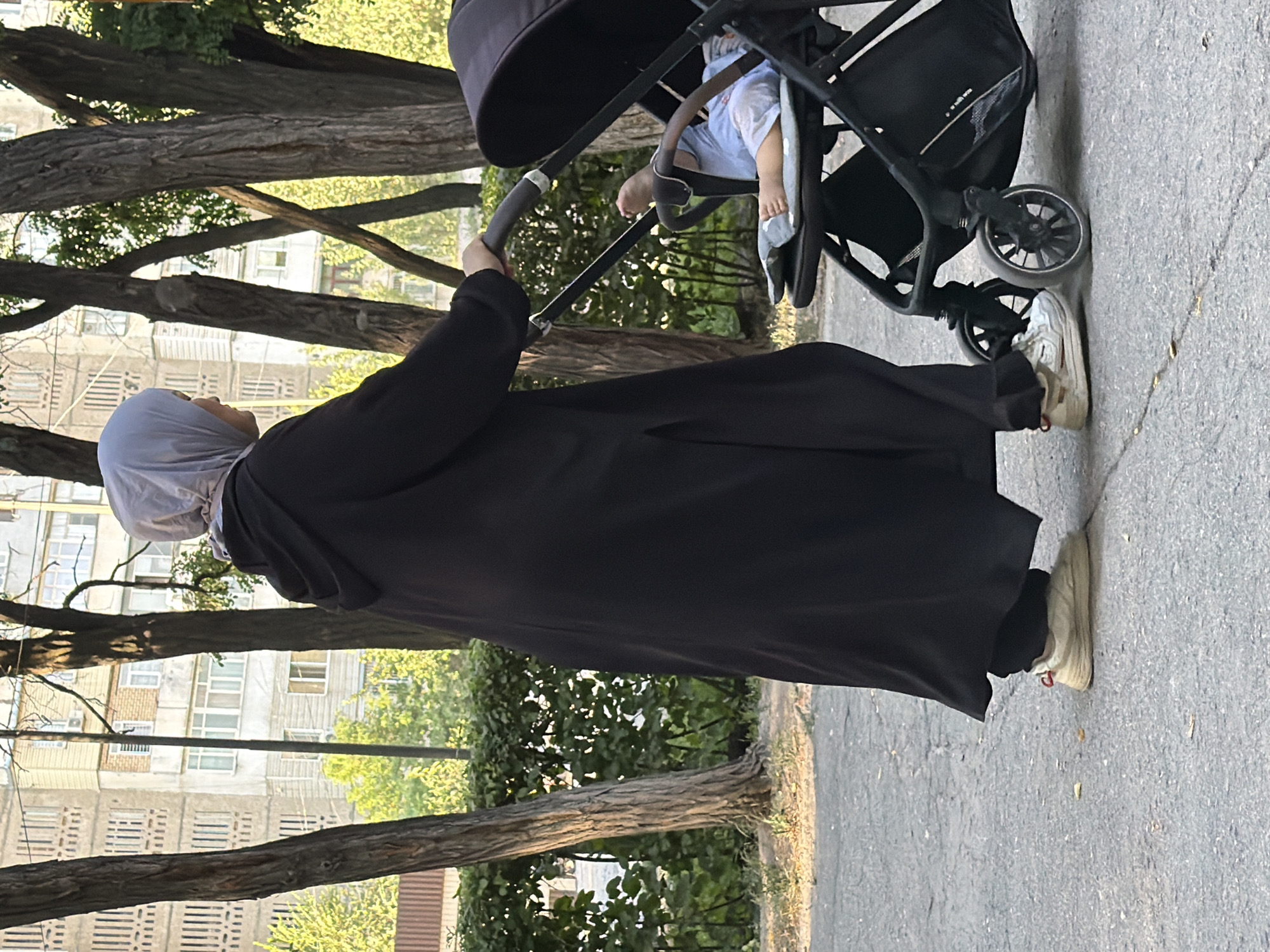 Afternoon park activity: walking, sitting, and hanging out outside