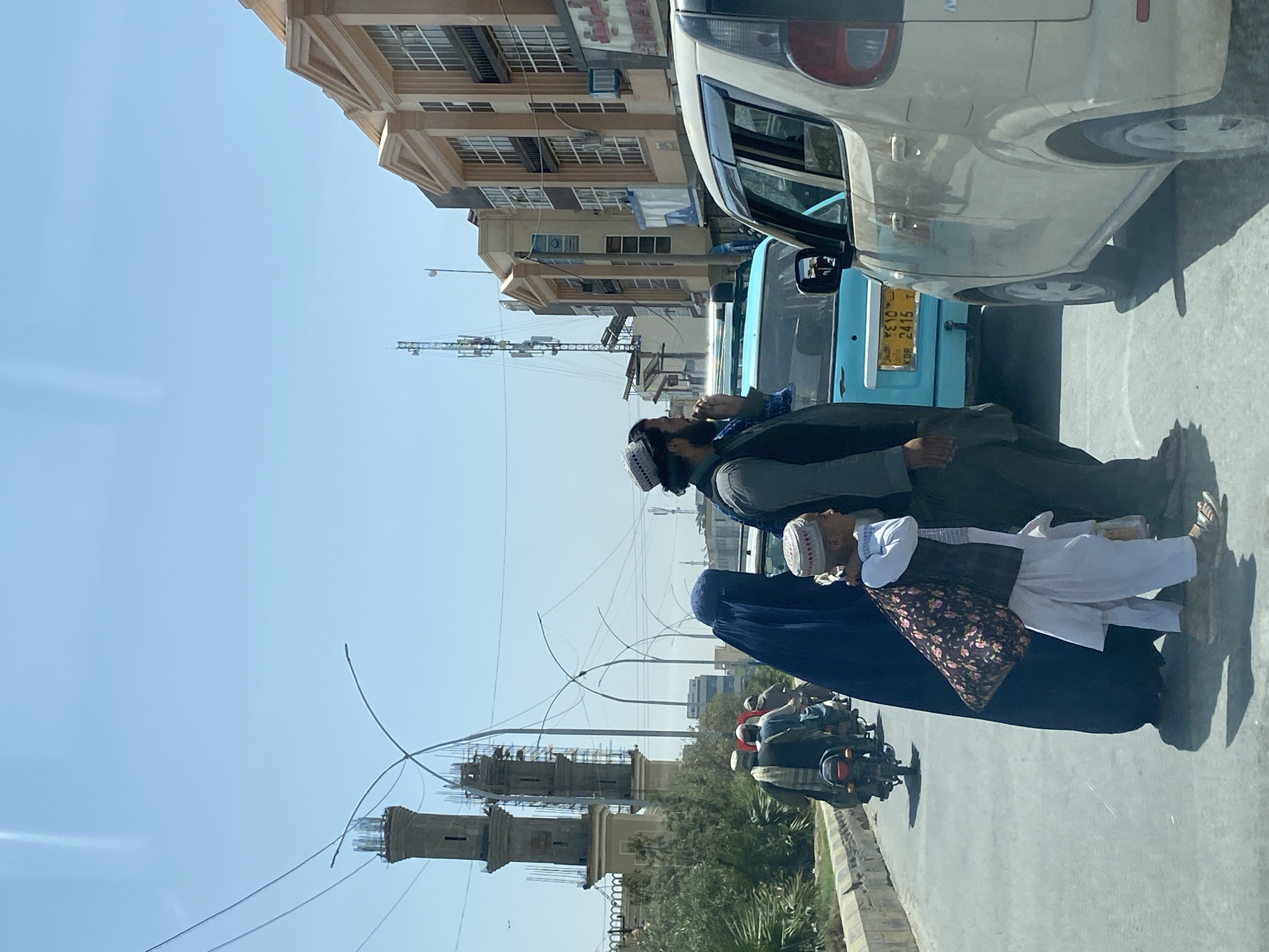 Kandahar street life and construction, with one flagged fake
